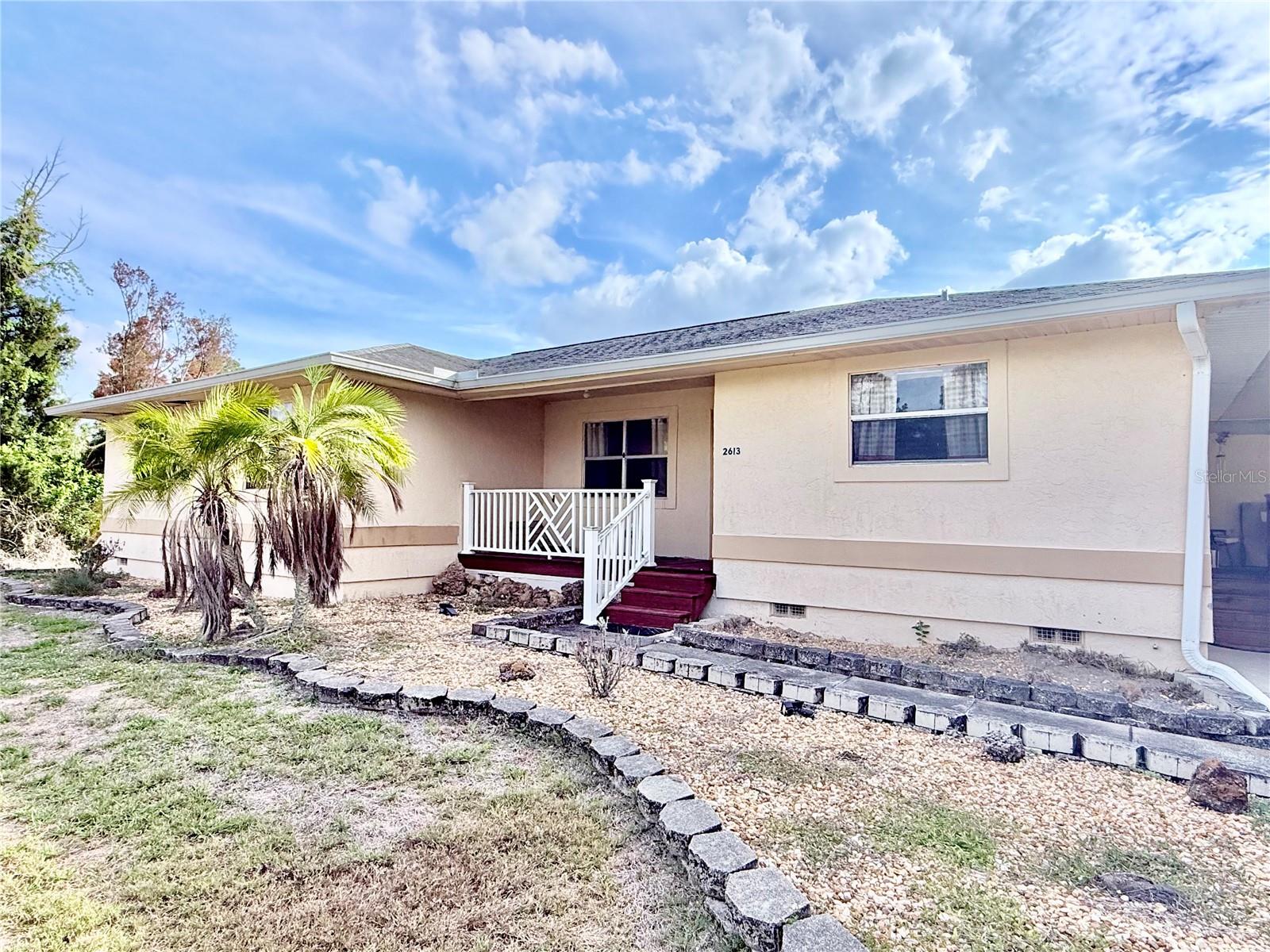 *** PRICE IMPROVEMENT *** THIS IS ONE YOU CAN"T SIT ON!!! Motivated Sellers!!!Incredible 3 Bedrooms and 2 full Bathrooms with an Office/Den/4th Bedroom on over half an acre with an ENCLOSED POOL and WORKSHOP!!! HUGE Kitchen with TONS of storage and 2 built in Pantry Cabinets. Florida Room was professionally closed in offering double the space that doesn't show in county records. Home has two Carports and a 2 Car Garage. Tons of space for all of those toys, hobbies and parking without the worry of HOA or Deed Restrictions. Home is Connected to City Water and is Not in a Flood zone. Roof is 2014, Pool and enclosure completed in 2014, Water Heater 2020 and A/C is 2012. Septic Tank needs to be replaced, and Sellers are providing a $7000 credit towards this need... WOW!!! Located in the fast growing and highly desirable North Port. Close to Shopping, Dining, Fishing, the beautiful Gulf Beaches, entertainment, walking trails, Biking Trails, and so much MORE!!!! Sellers are in the process of emptying out the home with a dumpster. THIS ONE YOU DON"T WANT TO MISS!!!!
