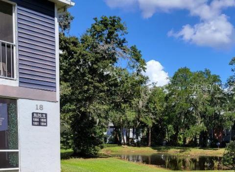Start Living the Florida Dream!!!! You have to see this Spectacular 2 bedroom 2 bath, 2nd floor Condo. Open floor plan, All Tiled floors and close to Everything!!! Spacious Living Room/Dining Room combo with a Fireplace for those cooler winter nights. The Utility room has a FULL SIZE Washer and Dryer (and the water is included in the HOA). Peaceful View from your private large screened-in Lanai/balcony. Large Master Bedroom has an en-suite bathroom as well as a walk-in closet....Split bedroom set-up so 2nd bedroom and bathroom are on the other side of the unit giving nice desired privacy. Super convenient Community full of Amenities including: Swimming pool to cool off in on those hot summer days, stay fit with a tennis court as well as a racquetball court and a fitness center. Then there's the water-front pier on Lake Minnie for Beautiful sunset views. Close to both Lake Mary Blvd and 17-92....LOCATION, LOCATION, LOCATION.....Call Now for your appointment...You're Gonna Love living here!!!