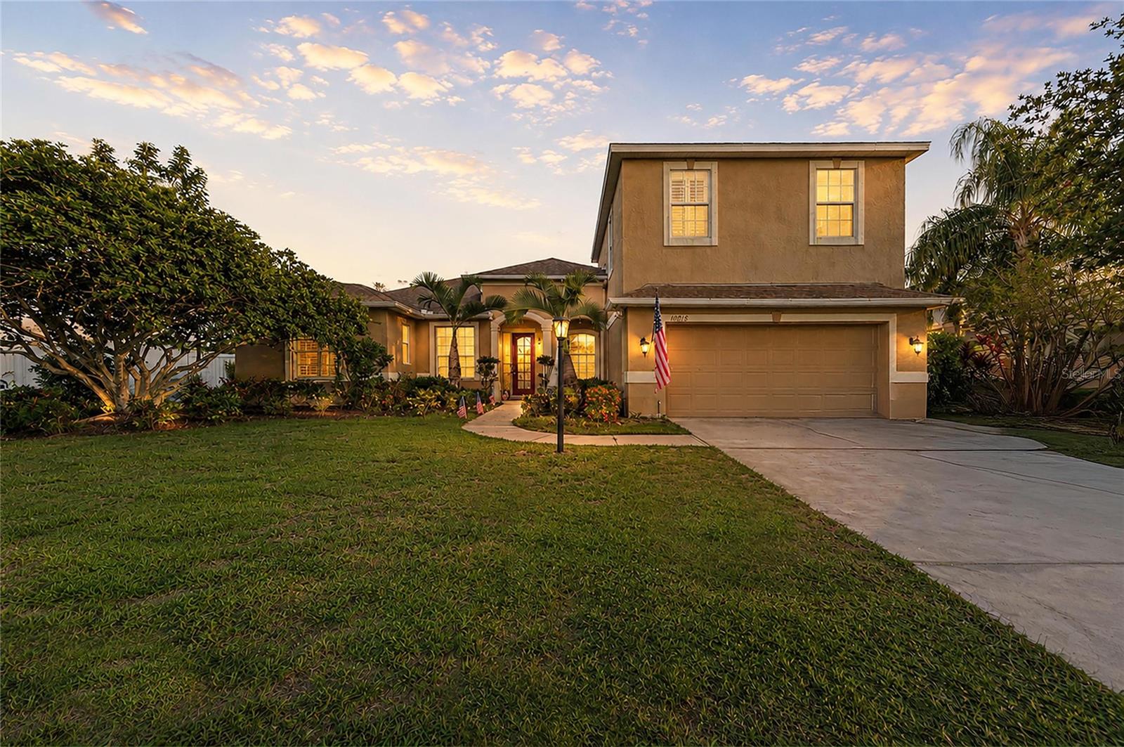 Rarely does a home check every box — but this stunning 4-bedroom, 3-bath pool retreat in the heart of Lakewood Ranch comes remarkably close. Set on nearly a quarter-acre lot with sweeping conservation views and a private screened-in pool, this 2,914 sq. ft. masterpiece delivers the Florida lifestyle you've been dreaming of, without compromise. From the moment you arrive, the pride of ownership is unmistakable. Inside, an intelligently designed floor plan puts the primary suite on the main level for ultimate convenience and privacy, while a spacious upstairs loft, additional bedroom, and full bath offer flexible space that adapts to your life — whether that's a guest suite, home office, or personal sanctuary. The heart of the home is a beautifully appointed kitchen featuring rich granite countertops, classic wood cabinetry, and a fresh, updated backsplash — all flowing effortlessly into the main living areas dressed in elegant tile flooring. Retreat to the bedrooms and sink into plush carpeting that adds a layer of warmth and comfort to every room. Outside, your private screened-in pool awaits, framed by lush, protected conservation — no rear neighbors, just nature and tranquility. Whether you're hosting a weekend gathering or unwinding after a long day, this backyard is your personal escape. Peace of mind comes standard here. Major updates include a newer roof, a newer HVAC system, energy-efficient solar panels (will be paid off at closing), and fresh neutral paint throughout — meaning the heavy lifting has already been done for you. All of this, paired with low HOA fees and a coveted location just minutes from Lakewood Ranch Main Street's vibrant dining, shopping, and entertainment scene. This isn't just a home — it's a lifestyle. Schedule your private showing today before someone else calls it theirs.