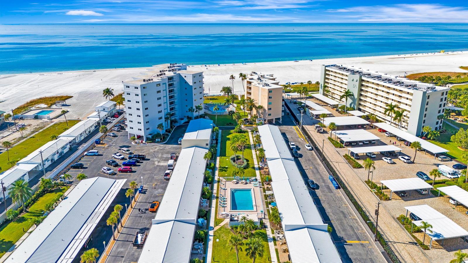 Welcome to a place where mornings begin with the sound of gentle waves and evenings settle into sunsets that linger long after the sky fades. This ground-level villa places you within steps of the Gulf in one of Siesta Key’s most cherished beachfront communities. The interior of this home has been completely transformed with a full remodel, bringing a fresh, modern feel to every room. This renovation was done with both comfort and longevity in mind, creating a space that is truly ready for its next chapter with a new owner. Updates include state-of -the art impact resistant doors and windows, a re-imagined kitchen with new lower cabinets and granite countertops, an upgraded primary bathroom, new base trim and interior doors, and all-new furniture and appliances, including a new dishwasher, refrigerator, washer, dryer, AC, and water heater. Jamaica Royale is known for its private white-sand beach, three heated pools, serene garden pathways, and welcoming coastal atmosphere. Not only do residents enjoy true maintenance-free living in Jamaica Royal, but cable, internet, water, and sewer are also included in association dues. The convenience continues with optional in-house rental management, allowing owners to easily generate income when they are away while keeping their home professionally cared for. Everything you need is within easy reach, yet every moment here feels like a getaway. Spend your days stretched out on the sand in a private cabana, making new friends while wandering the shoreline at sunset, or grilling up the day's fresh catch on the beachside BBQ. Then, when it's time for venturing out, public transportation makes it easy to head to downtown Sarasota, Gulf Gate, or Siesta Village for dining, music, and local coastal charm. If you have been waiting for the perfect home by the beach, that has already been beautifully updated and offers the full island lifestyle, this villa is the one. Schedule your private showing and experience what makes Jamaica Royale such a special place to call home. A 1% RATE BUY-DOWN IS AVAILABLE TO QUALIFIED BUYERS WHO WORK WITH THE SELLER'S PREFERRED LENDER.