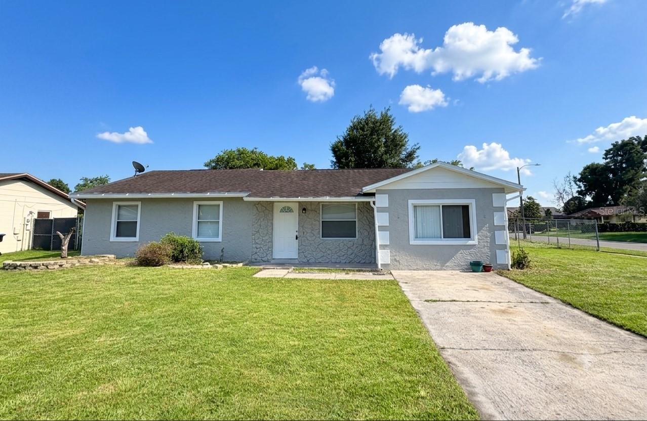 Welcome to this Beautifully updated 3 Bedroom 2 Bathroom BLOCK home with open floorplan located in a huge Corner Lot. NO HOA NEITHER CDD. NEW paining in and out. Newly renovated Kitchen with Quartz Countertop, Maple brown cabinets and beautiful mosaic backsplash. This house features large family room with build-in shelves great for family gathering and entertainment. Hugh fenced backyard for family amusements. Spacious storage with shelves & closets. Highly efficient central AC. Conveniently located near major highways, schools, shopping and public transportation. This home is great for first time home buyers or investors. Schedule your private showing today and discover all that this exceptional home.