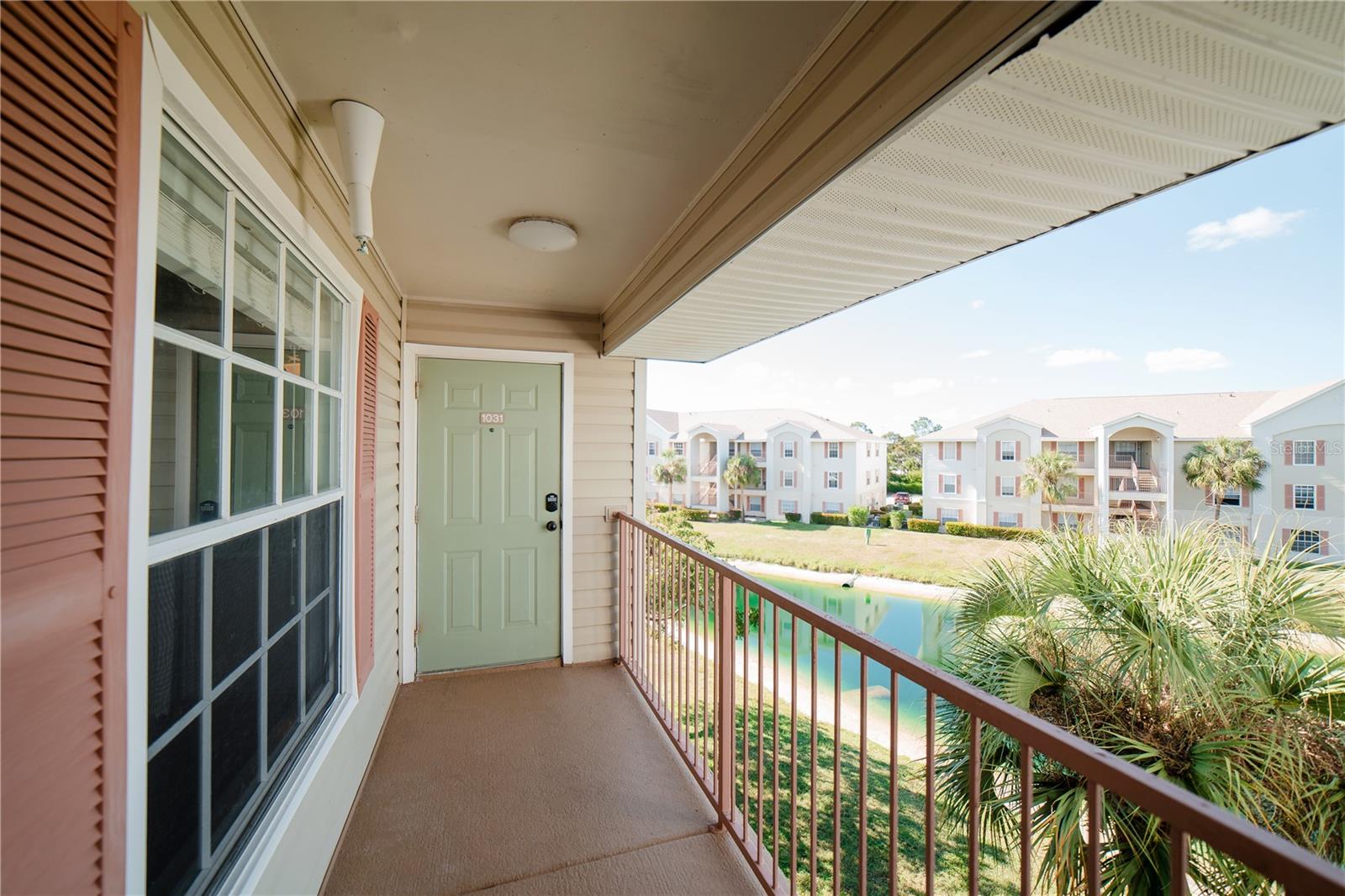 SPACIOUS TOP FLOOR CONDO WITH WATER VIEW, GREAT AMENITIES AND LOCATION! You will love this spacious, 3 bedroom 2 bath condo overlooking a community pond. Enjoy a view of the water from every main room of the condo. As you enter you will immediately appreciate the wide open floor plan showcasing tall vaulted ceilings and vibrant tasteful accent wall colors. The recently renovated kitchen boasts stainless steel appliances, quartz counter tops, a breakfast bar, and open viewing of the large great room. There is plenty of room for everyone in the 1,103 square foot condo with generously sized rooms. The oversized primary bedroom is situated on one side of the apartment providing privacy with a view of the water, a walk in closet and en-suite bath. The other 2 bedrooms are a nice size, have large closets and a view of the water. Resort-style community amenities include a community pool, fully equipped gym, basketball court, clubhouse, dog park, 2 playgrounds, and a picnic area with outdoor grills. There is a kayak and canoe launch with access out to the Caloosahatchee River. Enjoy direct access to the adjacent Four Mile Cove Ecological Preserve, exploring its 465 acres of wildlife, walking trails, boardwalks and piers. Located just minutes away from all the action, Coral Cove Condominium keeps you close to all the city's hot spots. This Community is conveniently located just minutes to world class beaches, fishing, golf, shopping, parks, restaurants, and plenty of entertainment. If you do need to venture out from all of this you are less than 1 mile to Del Prado Blvd or Veterans Parkway affording you quick access to everything. If you are looking for a great living or vacation space or an investment property, this is it. With so much to offer, you do not want to wait, schedule your showing today!