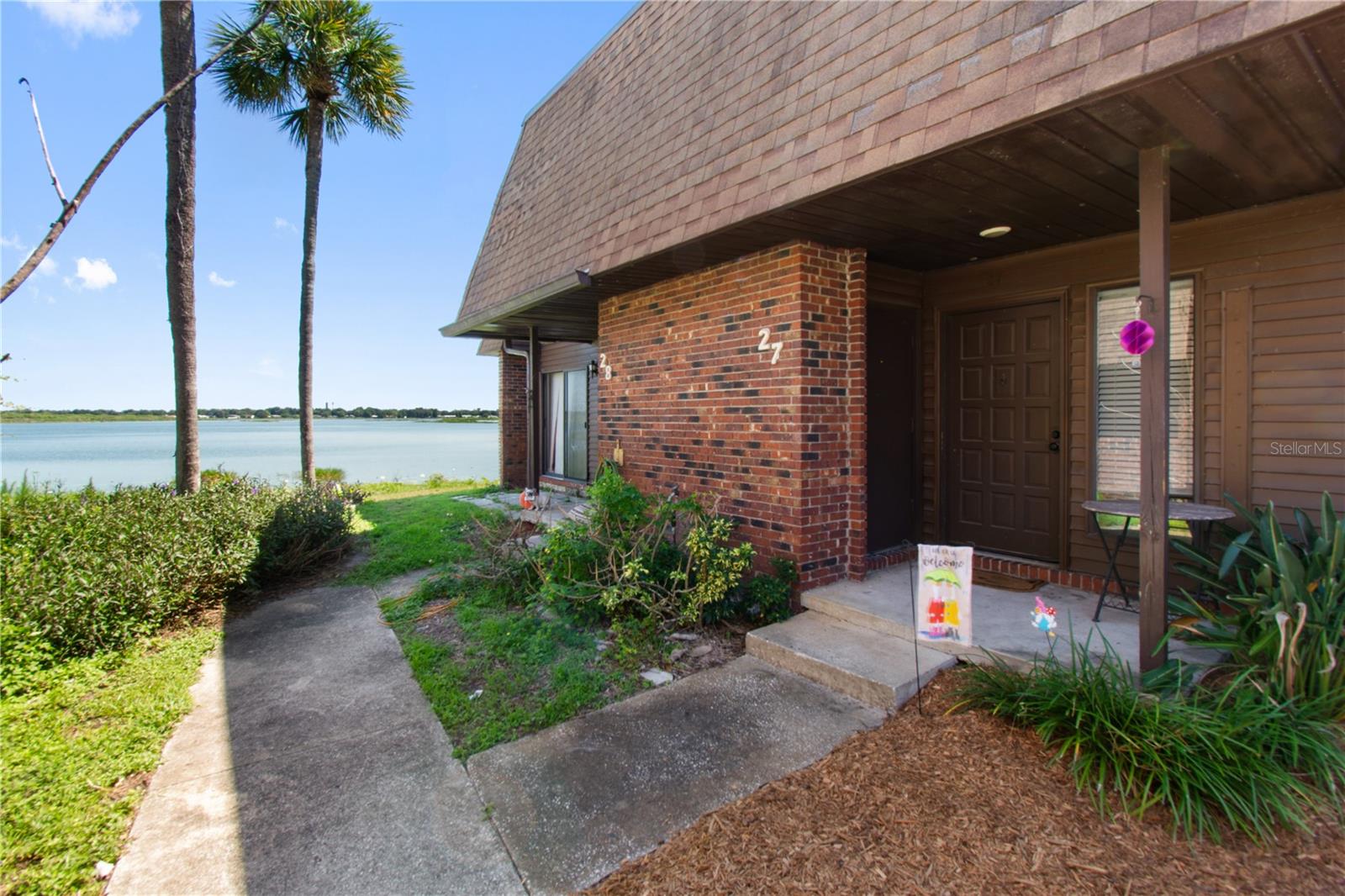 Welcome to your ultimate lakefront-adjacent retreat! Nestled just steps from the beautiful shores of Crystal Lake, this highly desirable 3-bedroom, 3-bathroom, two-story townhome in Unit 27 offers the perfect blend of space, comfort, and a resort-style lifestyle. The unique two-story floor plan provides excellent privacy and functional separation, boasting spacious living areas and three full bathrooms. Step outside your door to enjoy premium community amenities, including two sparkling swimming pools and private tennis courts. Whether you are looking for an active lifestyle or a serene lakeside escape right in the heart of Lakeland, this property delivers it all. Schedule your private tour today and start living the Florida dream! AC replaced 2020. Hot Water Heater 2017. Roof will be replaced by the HOA in 2028