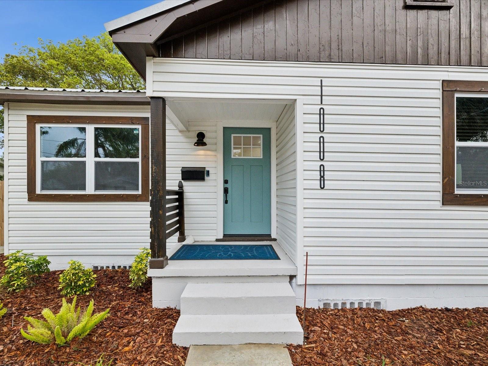 3/2 beautifully updated home in Seminole Heights, on a 62 x 135' lot, featuring modern finishes, a spacious back yard, and a prime location blocks from Interstate 275, City of Tampa beach volleyball courts, parks, dining and downtown Tampa. The kitchen features white cabinetry, quartz countertops, and stainless-steel appliances, while the primary bedroom offers the comfort of a private en-suite bathroom. Remodel includes all frame wood sprayed with termite protector, siding, windows, 6" baseboards, new flooring throughout, new electrical system with outlets and switches, new plumbing, new water heater, new blinds, new fans, dimmable lights throughout most rooms. Save on your homeowners insurance right away. With room for a pool, garden or entertaining, this house has room for it all.