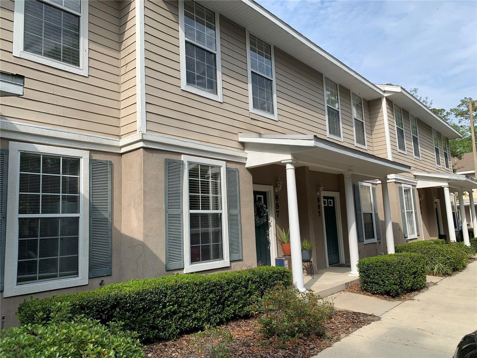 FOR RENT – Garland Condo Community

Welcome home to this beautifully maintained 2-bedroom, 2.5-bathroom townhome located in the highly desirable Garland Condo Community at 887 NW 21st Avenue, Gainesville, FL. Offering 1,324 square feet of comfortable living space, this spacious two-story home combines modern style, convenience, and low-maintenance living.

The open-concept first floor features attractive flooring, a spacious living and dining area, and plenty of natural light. Upstairs, you'll find two generously sized bedrooms, each offering privacy and comfort. The primary suite includes access to a private balcony, perfect for enjoying your morning coffee or unwinding after a long day.

Enjoy outdoor living with a covered patio, plus access to the community swimming pool. Conveniently located near the University of Florida, UF Health, shopping, dining, and downtown Gainesville, this home offers easy access to everything Gainesville has to offer.

Property Features:
2 Bedrooms
2.5 Bathrooms
1,324 Sq Ft
Private Balcony
Covered Patio
Community Pool
Spacious Living & Dining Areas
Prime Gainesville Location