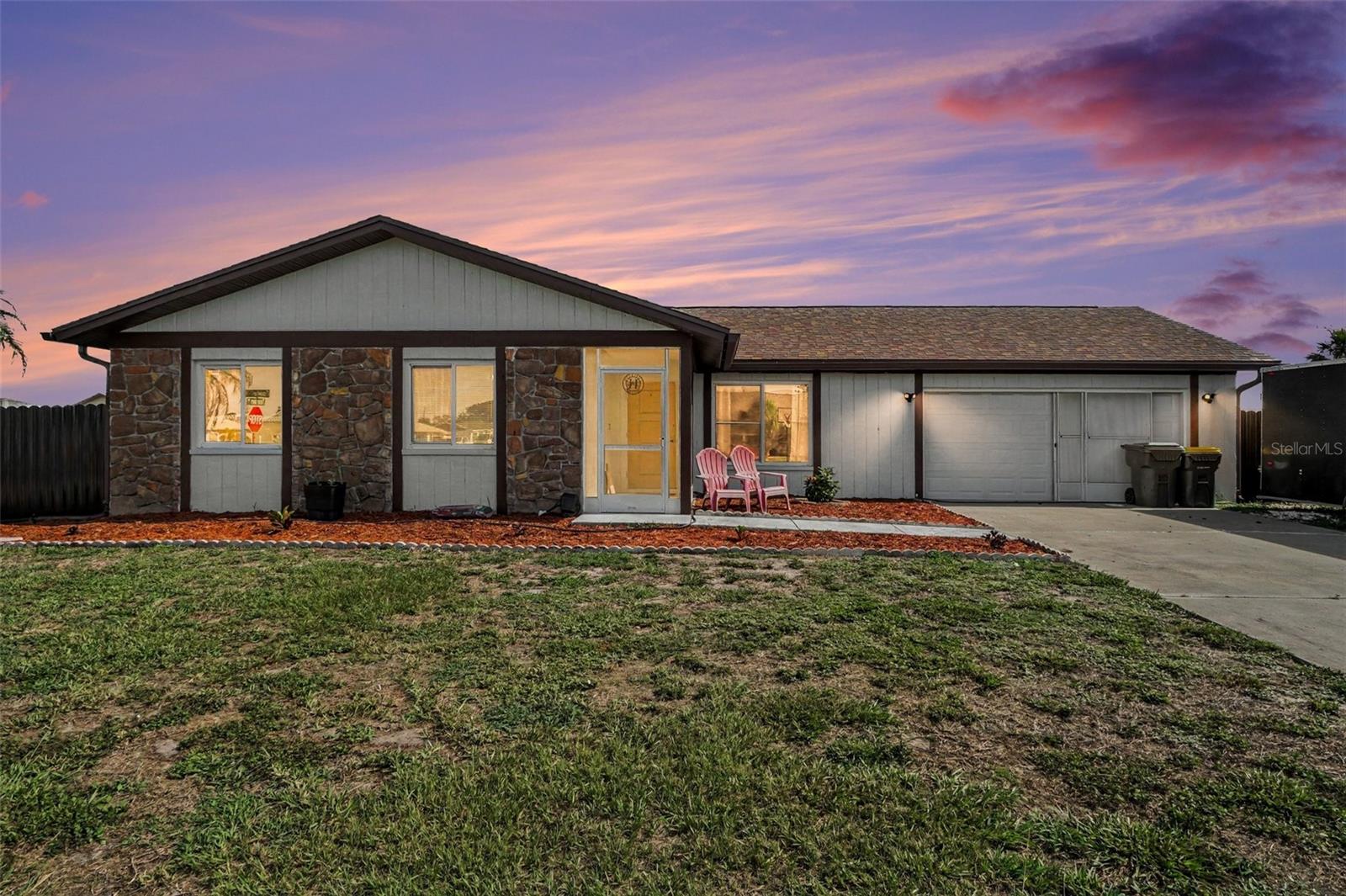 Welcome to this move-in ready 3-bedroom, 2-bath pool home situated on an oversized corner lot in the desirable Gardens of Gulf Cove community. Freshly painted inside and out, this home offers a bright, inviting atmosphere with comfortable living spaces designed for everyday living. Be sure to view the attached virtual tour and photo gallery. The living room features an electric fireplace, creating a cozy focal point, while the kitchen offers stone countertops, stainless steel appliances, including a refrigerator and range, and plenty of workspace for preparing meals. A dedicated laundry room and a new water softener enhance the home's convenience. Step outside to your private backyard where there's plenty of room around the pool for relaxing, entertaining family and friends, or simply enjoying the Florida sunshine. The pool is enclosed by a safety fence, while the property also features new metal fencing and updated front landscaping, adding privacy and curb appeal. The spacious backyard provides plenty of room for your boat, personal watercraft, outdoor play equipment, pets, and all your favorite recreational toys. Major updates have already been completed, including a 2023 roof, hurricane-impact windows, 2020 A/C, and a 2019 electrical panel,  giving buyers added peace of mind. Residents of Gardens of Gulf Cove enjoy low HOA fees and an array of amenities, including two community pools, tennis and pickleball courts, a recreation center, and numerous social activities. Conveniently located near Gulf beaches, boating, golf courses, shopping, dining, and more, this home offers the perfect opportunity to enjoy the Southwest Florida lifestyle.