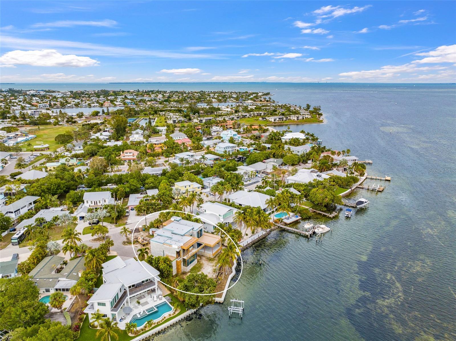Under Construction. Stunning 4-bed, 6-bath new build home at 515 56th St, Holmes Beach.. Embrace modern coastal living with a sleek contemporary design. You will love the open floorplan, detailed custom living spaces and bonus rooms throughout the property. This waterfront gem boasts 108 ft of direct bay frontage, offering breathtaking open water views. This property promises a luxurious lifestyle in a prime location. Don't miss the chance to put your finishing touches on this beauty and call this masterpiece home. Call today to get this slice of brand new paradise on Anna Maria Island!