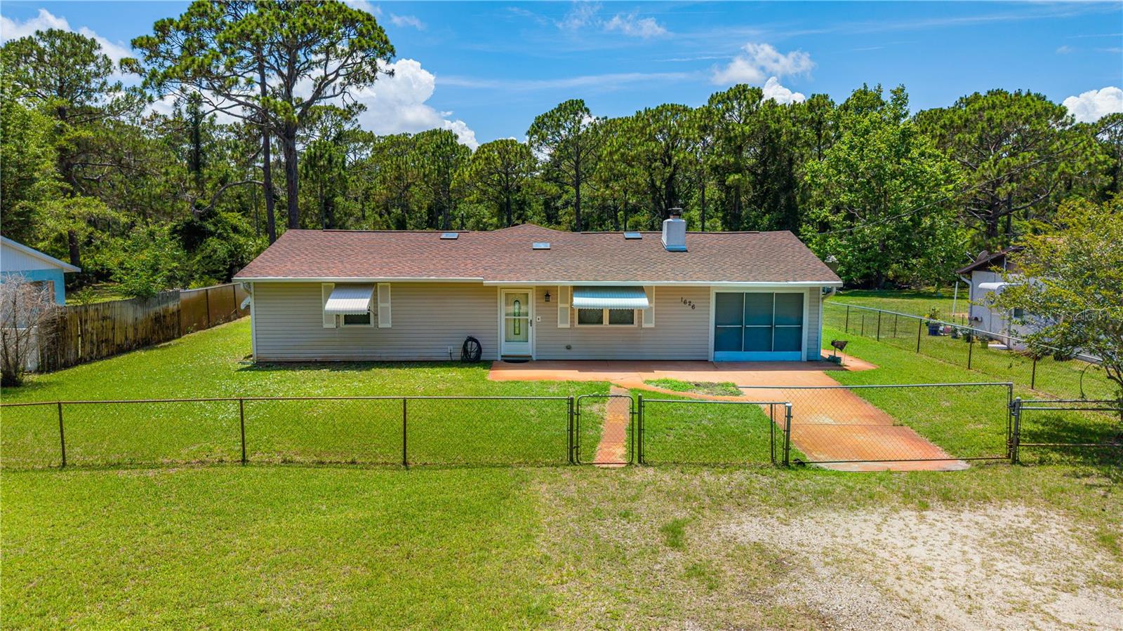 Location, Location, Location, This  lovely, well cared for 3 bedroom 2 bath home is within a short distance to the Middle school, High school and Daytona State College. This home fits the needs of everyone. Close to shopping and 10 minutes to the beach.Large fenced in yard with room for a pool. Nice shed for a workshop or storage. The one car garage has door opener with lots of storage. The roof was installed 1/12/2026. Furniture is negotiable.