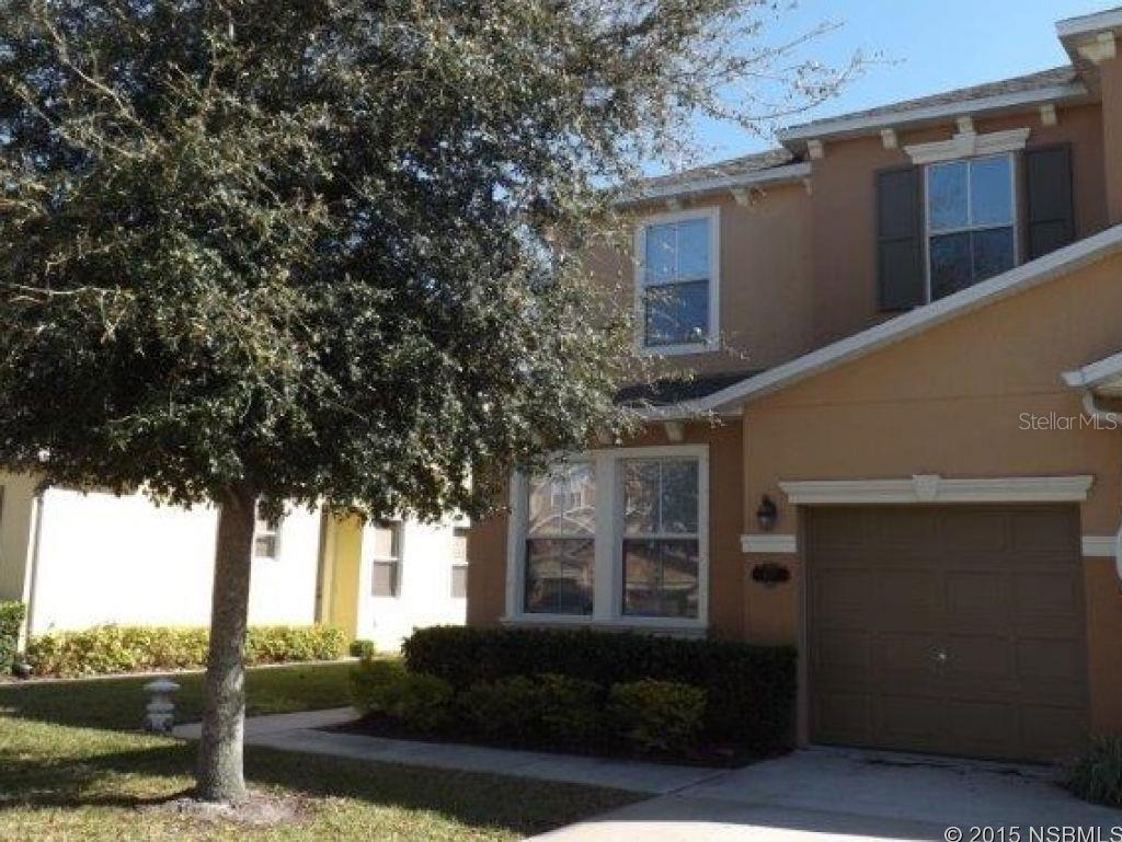 Reduced and priced to sell!  Come see this immaculate, one owner townhome just minutes from the beach!  You will love this bright end unit with loads of extra windows.  This three bedroom, two and half bath townhouse also boasts a beautiful open floor plan, nice high ceilings, and a screened-in porch with full shingled roof, a ceiling fan with light, and a tiled floor.  The main living area has tons of additional recessed lighting and beautiful wood-laminate floors.  The kitchen has plenty of counter space with a nice island, Corian counter tops, and upgraded cherry cabinets, as well as a huge pantry!  All kitchen appliances are included with the property, including a stainless steel refrigerator, black microwave, stove and oven combo, and dishwasher!The first floor half bath has a huge linen closet for extra storage, or use the pipes that have already been run behind the drywall and convert to a shower to create another full bath!  A large office with a ceiling fan is also located on the first floor and could easily be turned into a fourth bedroom or family/media room.  On the second floor landing is a bonus area that would make a nice sitting area or a perfect spot for a student desk and computer.  There is a large, separate laundry room conveniently located on this floor near the bedrooms.  The master bedroom has a walk-in closet, ceiling fan, and its own well-appointed bathroom.  Two sinks, extra high countertops, a deep soaker tub, and a very large linen closet make this a great master bath! All bedrooms have some built-in shelves in closets, as well as ceiling fans with lights.  This house comes complete with hurricane shutters for peace of mind!  The one car garage has  included storage shelves in the back, a suspended shelf already installed and ready, and a very bright shop light.  There is an unfinished attic with access in the master closet.  All first floor windows and doors wired to alarm system.  New walking trails are just around the corner! ;Water: City
