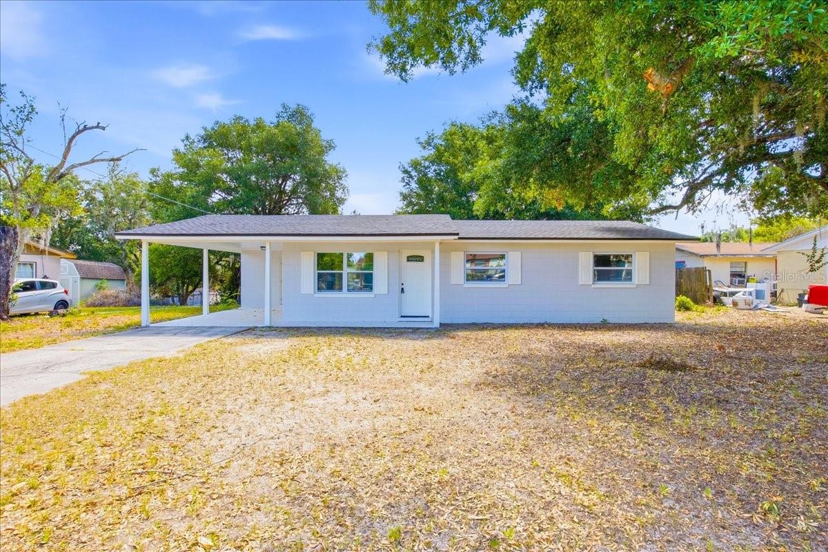 Beautifully fully remodeled 3-bedroom, 1.5-bath home with a carport located in the heart of Lake Alfred! This move-in-ready property combines modern upgrades with peace of mind improvements throughout. Major updates include a new roof (2022), a new AC system (2023), and a water heater.

The stunning 2026 full remodel features luxury vinyl plank flooring throughout, fresh interior and exterior paint, new windows, and a new sliding glass door that fills the home with natural light. The completely updated kitchen showcases new cabinets, countertops, and appliances, while the remodeled bathroom offers a clean, modern design. Additional upgrades include new fixtures, ceiling fans, and custom closet doors.

Enjoy comfortable living with a functional layout, covered carport, and convenient location close to shopping, dining, parks, and major roadways. This beautifully updated home is truly move-in ready and offers the perfect blend of style, comfort, and value in growing Lake Alfred! This home qualifies for 100% financing using the UCB PATH Program.