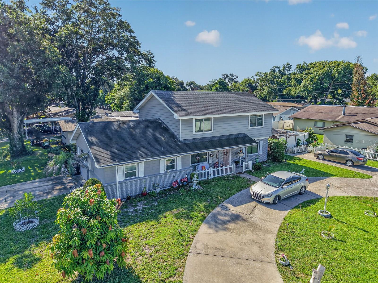 Welcome to this spacious and beautifully maintained 3-bedroom, 2-bath home offering over 2,280 square feet of living space on a desirable corner lot in an established Northeast Winter Haven neighborhood near Lake Elbert. With tasteful updates, multiple living spaces, and the rare opportunity to purchase the home completely furnished, this property is move-in ready.
The remodeled kitchen serves as the heart of the home, featuring granite countertops, lots of cabinets, a built-in wall oven, cooktop, and microwave—creating the perfect space for preparing meals and entertaining family and friends. The adjoining great room offers an inviting place to gather, highlighted by a charming decorative fireplace that adds warmth and character.
One of the home's standout features is the spacious downstairs bonus room with direct exterior access, providing incredible flexibility. Whether you need a media room, game room, home office, fitness area, guest quarters, or potential in-law suite, this versatile space can easily adapt to your lifestyle.
Upstairs, the oversized primary suite offers a generous walk-in closet, while two additional bedrooms provide comfortable accommodations for family or guests. Both bathrooms have been tastefully remodeled.
Throughout the home you'll find durable wood, ceramic tile, and laminate flooring—there's no carpet to maintain. Additional features include an enclosed sunroom, inside laundry room, abundant storage, a detached workshop/storage building, a fenced backyard, and two convenient parking areas with both a circular driveway and a traditional driveway.
Major updates provide added peace of mind, including replacement windows installed in 2021 and a roof replaced in 2018.
Being offered completely furnished, this home presents an outstanding opportunity for buyers looking for a primary residence, seasonal Florida retreat, or a property that can be enjoyed immediately. Its flexible floor plan and convenient location also make it an attractive option for those considering long-term rental opportunities.
Conveniently located just minutes from Lake Elbert, Polk State College, Winter Haven Hospital, downtown Winter Haven, shopping, restaurants, medical facilities, and the area's beautiful Chain of Lakes, this home combines generous living space, thoughtful updates, and exceptional versatility in one desirable package.