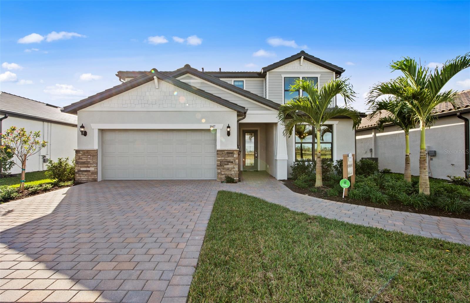 Pre-Construction. To be built. Introducing the Yorkshire, an expansive and beautifully designed 5-bedroom, 4.5-bath residence located in the exclusive new-construction community of Grandura in Sarasota. This impressive floorplan offers exceptional versatility with a dedicated den, a flex space, and a spacious loft, providing multiple areas for work, relaxation, and entertainment. Three of the bedrooms are private ensuites, ideal for multigenerational living or hosting guests in comfort.

The gourmet kitchen features built-in appliances and modern finishes, while the owner’s suite showcases an enlarged spa-style shower for a luxurious retreat. Additional upgrades include laundry room cabinets with sink, impact-resistant glass windows, and a pocket sliding glass door that enhances indoor-outdoor living. With no CDD fees, this home delivers both luxury and long-term value.

Grandura is an intimate enclave of just 28 thoughtfully designed homesites, offering a rare opportunity to own new construction in one of Sarasota’s most desirable locations. Enjoy close proximity to top-rated schools, premier shopping and dining, world-class golf courses, and the iconic white sands of Siesta Key Beach—only 3 miles away.

This is the perfect blend of space, sophistication, and coastal convenience. Schedule your private showing today.