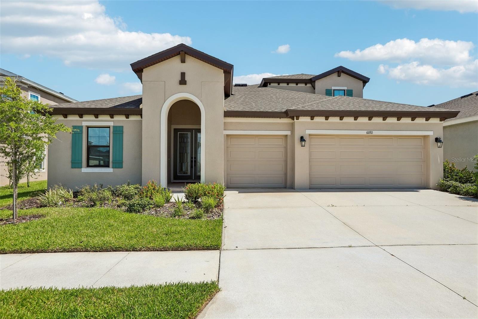 Welcome to luxury living in the highly sought-after, master-planned community of Waterset! This beautifully upgraded 4-bedroom, 4-bathroom pool home impresses from the moment you arrive, featuring mature landscaping, an oversized driveway, and a 3-car garage with epoxy flooring. Step through the grand foyer into an expansive great room highlighted by soaring wood-beam ceilings and a full wall of 8-foot pocket slider doors that open to your own private outdoor retreat, complete with a heated and chilled saltwater pool and spa within a spacious screened enclosure.
The kitchen features Calacatta Novello quartz countertops, Sonoma Linen cabinetry, luxury vinyl flooring, an expansive breakfast bar, and an extended dining area that’s perfect for entertaining. The secluded Owner’s Retreat offers dual walk-in closets and a luxurious bath with a soaking tub and oversized shower, while the private office with French doors provides the perfect work-from-home space or flexible fifth bedroom. Upstairs, a versatile bonus room with an en-suite bedroom and full bath creates an ideal guest retreat or multi-generational living space.
Additional highlights include a tankless gas water heater and dual HVAC units for maximum efficiency and year-round comfort. Residents enjoy Waterset’s incredible amenities, including resort-style pools, splash pads, dog parks, playgrounds, fitness centers, a clubhouse, café, and miles of walking trails. Combining premium upgrades, exceptional indoor-outdoor living, and an outstanding location, this home is truly move-in ready.