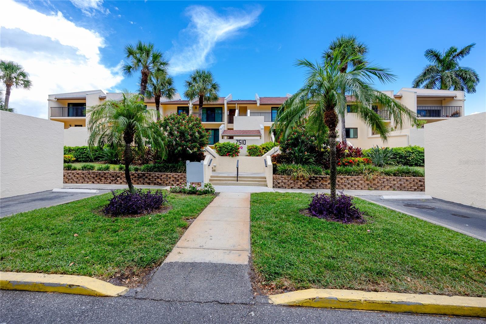 Bay views greet you the moment you step through the front door of this first-floor Seapointe Terrace condo on Tampa Ba, and they follow you through the main living areas, the primary bedroom, and out onto the 37-foot extended patio that runs the width of the unit.
The open floor plan moves easily from living to dining with large windows pulling in natural light and water views throughout. The stylishly updated kitchen is built for convenience and practicality, enjoy the abundant white cabinetry with extensive storage, granite countertops with waterfall breakfast bar, and stainless steel appliances. The living room and primary suite both open directly to the extended patio through sliders, making the connection between inside and out feel effortless.
The primary suite overlooks Tampa Bay and includes an en-suite bath with a split vanity and additional built-in closet opposite the vanities. A separate laundry room sits just off the hall and features its’s own built in closet for easy cleaning organization. A second enclosed patio with slider access anchors the secondary bedroom, and the front porch with storage closet provides a quiet entry point that flows naturally into the kitchen and main living space. Three distinct outdoor areas in total, each with its own use.
The heated waterfront pool sits just 100 feet from the unit. Tennis courts, 2 pickleball courts, a fishing pier, a kayak launch, dock, and community storage for bikes and kayaks round out the on-site amenities. Monthly fees cover water, sewer, trash, cable, high-speed internet, and building reserves. The milestone study is complete with fully funded reserves.
From Seapointe Terrace, I-275 is minutes away, placing you within easy reach of downtown St. Petersburg, Fort DeSoto Park, Maximo Park, area beaches, and waterfront dining and entertainment at Sky Beach Resort. A well-maintained building, a strong reserve position, and a Pinellas County waterfront address — worth a look in person.