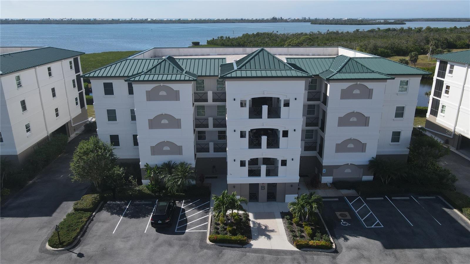 FANTASTIC ONDO!  FANTASTIC VIEW! FANTASTIC WATERFRONDT COMMUNITY!  FANTASTIC PRICE!  This a GREAT BUY for the waterfront condo you have been looking for.  Words cannot describe the beauty of the Grande Preserve complex and this Grande Preserve condo.  This condo has 3-bedrooms, 2/1 bathrooms, primary bath has a garden tub and separate private shower, walk-in laundry room and separate walk-in large kitchen pantry.  Grande Preserve is one of the most sought-after waterfront communities in the Englewood/Placida area.  It doesn't get any better than this.  This unfurnished, upscale condo provides a panoramic view of Lenon Bay and the ICW.  The condo also overlooks a scenic pond with a fountain and preserve with a variety of birds and wildlife.  The split floor plan layout separates the expansive primary suite from 2 guest bedrooms.  All bedrooms have an abundance of room and closet space for storage and/or guests clothing for extended visits.  Both family and friends will love this condo's layout designed for private and luxury living.  The kitchen has abundant cabinets and counter space for cooking and countertop appliances.  A large walk-in pantry off the kitchen is perfect for storing food as well as extra counter appliances when not needed.  The Grande Preserve on Lemon Bay complex is resort style living featuring a "show place" ICW marina.  This condo has a 30ft boat slip with a 13,000-pound lift.  This waterfront package of an upscale condo and resort community living is a must see.  Schedule a showing today!