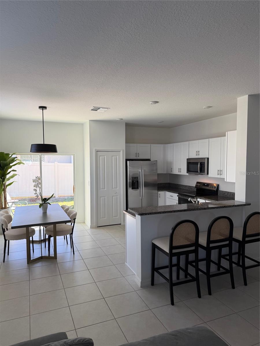 Virtually Staged. Lagoon life starts here! If you've been dreaming of living where every day feels like a vacation, this beautifully maintained 2-bedroom, 2.5-bath end-unit condominium in the highly sought-after Mirada Lagoon community is a must-see.

Enjoy the privacy and abundance of natural light that only an end unit can provide. The spacious kitchen flows seamlessly into the dining and living areas, while both bedrooms feature private en-suite bathrooms, creating the perfect layout for family, guests, or a home office. A convenient half bath is located on the main level for visitors.

Step outside and experience the incredible lifestyle that makes Mirada one of the Tampa Bay area's premier communities. Residents enjoy access to the spectacular 15-acre crystal-clear lagoon, featuring sandy beaches, kayaking, paddleboarding, swimming, waterfront events, and year-round resort-style amenities unlike anywhere else. The community also offers scenic walking trails, parks, dog parks, playgrounds, and convenient access to shopping, dining, and major highways.

Whether you're looking for a full-time residence, seasonal retreat, or low-maintenance Florida lifestyle, this exceptional home delivers the perfect combination of comfort, convenience, and unforgettable lagoon living.

Don't miss your opportunity to own a piece of paradise—schedule your private showing today!