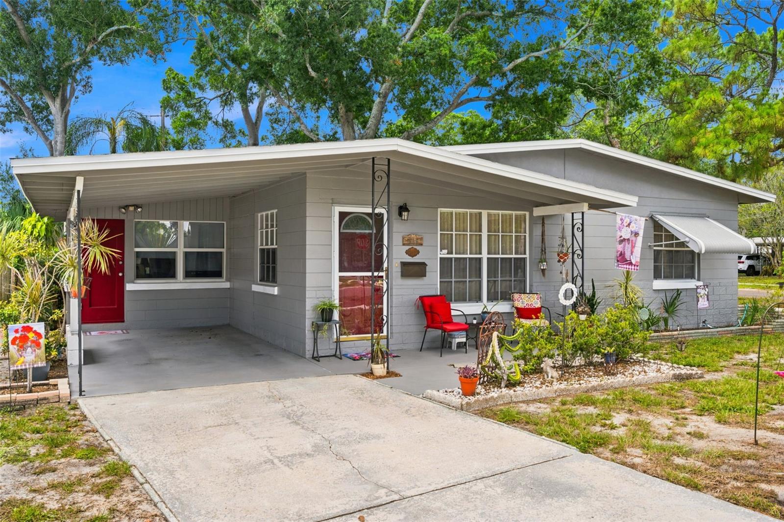 Meticulously maintained, this move-in ready home offers convenient comfortable living on a desirable corner lot.  Block construction, this adorable home features double French doors that fill the living areas with natural light. Updated bathroom and numerous major system improvements provide peace of mind, including a NEW roof (2026), A/C with heat pump (2021), and water heater (2022). Whether you're a first-time homebuyer, seasonal resident, or investor, this home is ready for immediate enjoyment.Situated on a spacious corner lot, the property offers abundant room to park a boat/RV, or room for a future pool, with plenty of space remaining for a garden and outdoor entertaining area. Washer and dryer stay in the home for you.  Conveniently located near shopping and restaurants, this charming home combines affordability, flexibility, and location in one appealing package. Don't miss your opportunity to make this delightful home your own!
