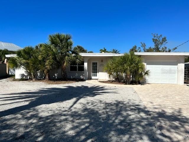CASEY KEY,BOAT LIFT & BOAT DOCK, LONG TERM,SHORT TERM FURNISHED OR UNFURNIShED. Cute one story ranch style house tucked away on a cul-de-sac on private Casey Key. All hardwood floors, one car garage and behind the house is a large lawn leading to a dock on a mangrove lagoon that leads out to the intracoastal waterway, perfect for kayaking . This house has two bedrooms and two bathrooms, the main living areas are all open plan that include the kitchen. Great location not too far from the Albee Farm Bridge to the mainland. Owner approval needed for dogs. HIGH SEASON $7,000 per month, OFF SEASON $4,000 per month and $3500 for an annual lease.  Available Now!!  Call today and enjoy Florida living!!!