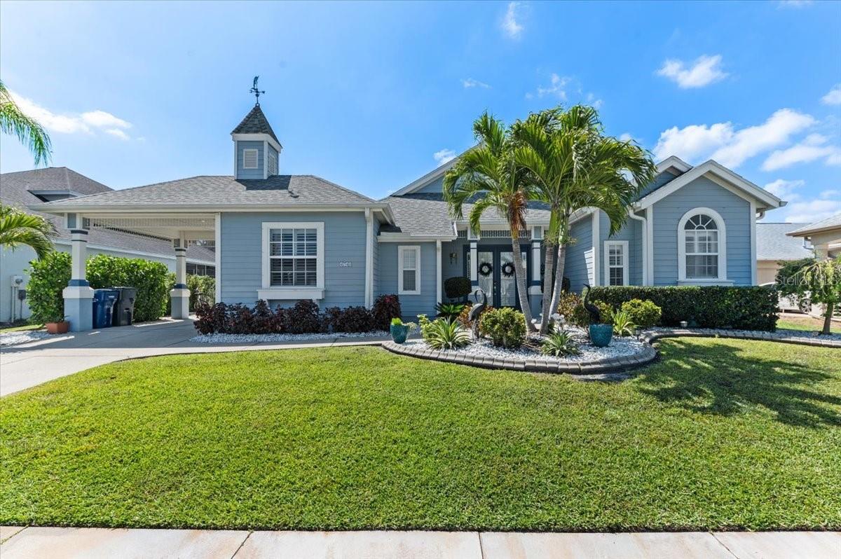 Updated Price! Welcome to an exceptional, one-of-a-kind, expression of Florida waterfront living—where refined design, significant investment, and effortless boating access come together along a private freshwater canal with direct reach to the Manatee River, Tampa Bay, and the Gulf of Mexico. With over **$250,000 in recent upgrades**, this residence offers a true turnkey lifestyle defined by quality craftsmanship, modern convenience, and seamless indoor–outdoor living.

From the moment you enter, the home makes a striking impression. Expansive, light-filled spaces are complemented by soaring ceilings, a natural gas double-sided fireplace, custom shiplap accents, crown molding, and a clean, contemporary aesthetic. The open-concept floor plan has been thoughtfully enhanced to maximize flow and functionality, anchored by all-new luxury vinyl plank flooring throughout the main living areas.

At the center of the home, the fully renovated kitchen delivers both style and performance. Featuring premium quartzite surfaces, upgraded stainless steel appliances, and a well-appointed butler’s pantry, it is equally suited for everyday living and upscale entertaining. The primary suite serves as a private retreat, offering tranquil pool and water views along with a spa-inspired bath designed for comfort and relaxation.

The home’s versatility is further elevated by an approximately 700-square-foot second-floor addition, complete with 2 additional bedrooms, a full bathroom, and generous storage—ideal for guests, multigenerational living, or a private flex space.

Outdoor living is where this property truly excels. A panoramic screened lanai frames the updated saltwater pool, showcasing new tile finishes and fully integrated smart controls. The outdoor kitchen, complete with built-in grill and mini refrigerator, creates an ideal setting for entertaining against the backdrop of peaceful canal views. Additional features including a whole-home gas Generac generator and roll-down hurricane shutters provide both comfort and peace of mind.

For boating enthusiasts, the dock is exceptionally well-equipped with electric, fresh water, a fillet station, and a 10,000 lb HydraHoist boat lift—offering immediate access to open water with ease.

Further enhancing the home’s value and efficiency:

* Two new air conditioning systems (2025)
* On-demand tankless hot water heater
* 220V electric vehicle charging outlet
* Fully integrated smart home system with Google Nest thermostats, bluetooth speakers throughout living area, video doorbell, exterior cameras, and WiFi-enabled pool controls

Beyond the home, the community offers a well-rounded coastal lifestyle with amenities including a kayak launch, scenic mangrove walking trails, playground, tennis courts, and a community boat ramp.

Whether hosting with expansive sliders open to the lanai, enjoying quiet sunset evenings poolside, or heading out for a day on the water, this residence delivers a rare blend of luxury, lifestyle, and location—just minutes from world-class Gulf beaches, UTC shopping and dining, and Sarasota-Bradenton International Airport.