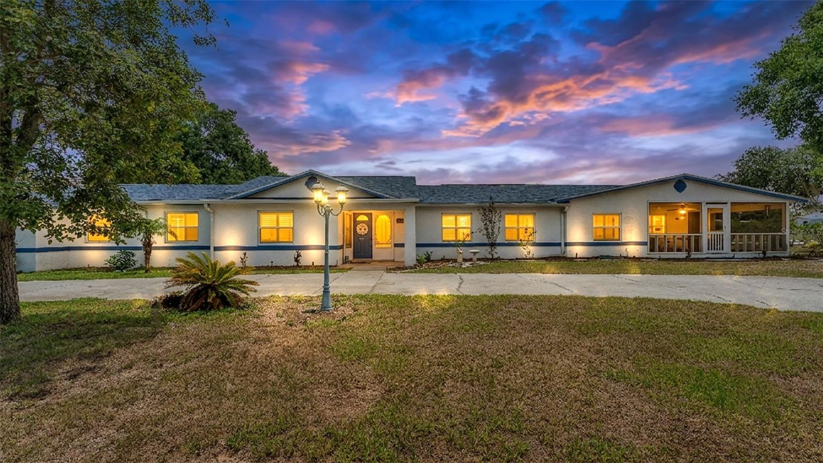 One-of-a-kind pool home on over half an acre in Bartow with NO HOA!! Full of character, charm, and thoughtful updates, this spacious property offers over 3,500 square feet of living space and a flexible triple-split floor plan with room for everyone. With multiple living areas, two kitchens, a formal dining room, and a "she shed", there is no shortage of space for everyday living or entertaining. The main living room welcomes you with generous space and two sets of French doors leading out to the screened pool area. The large galley-style kitchen offers abundant storage, custom cabinetry, stone countertops, stainless steel appliances, a breakfast bar, walk-in pantry, crown molding, and access to the formal dining room. A standout feature of this home is the attached in-law suite with its own private entrance!!! This flexible space includes one bedroom, a living area, small dining space, kitchenette, and an en-suite bathroom complete with a corner shower, clawfoot tub, and private water closet — ideal for extended guests, multi-generational living, or a private retreat. Outdoor living is just as impressive, with four screened enclosures, a spacious pool area with a resurfaced pool, all of which make this home ready for summer entertaining! The backyard is fully fenced with vinyl fencing, offering added privacy and usable outdoor space. There is also an unfinished pool house with a functioning half bathroom, offering additional potential for future use. This unique property offers space, charm, flexibility, and so much potential — a rare find in the heart of Bartow!