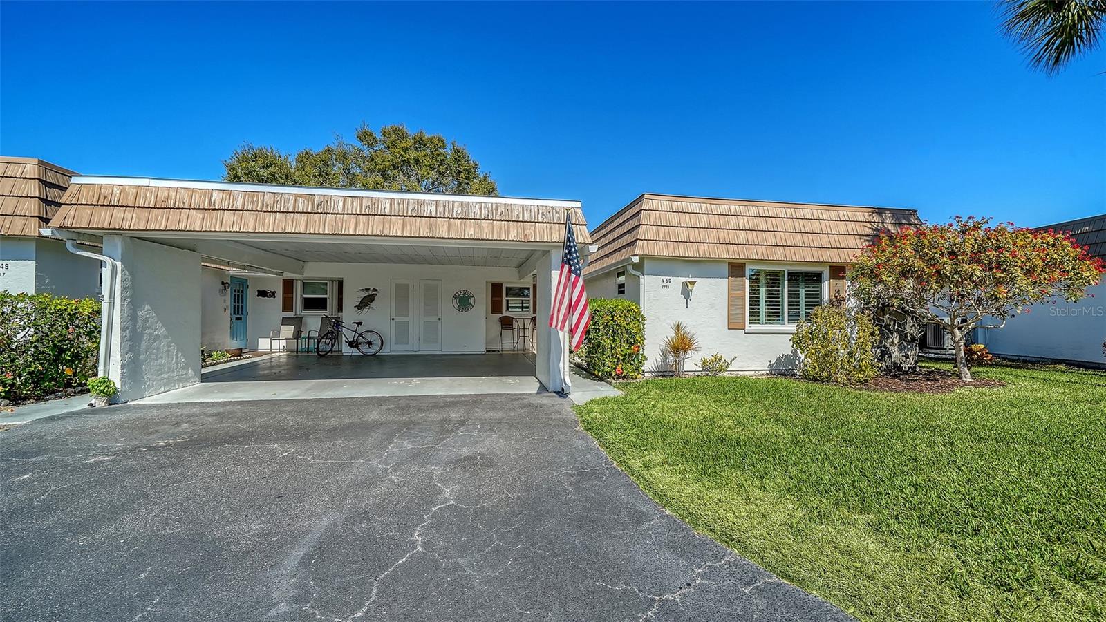 Located in Sarasota, Minutes from Beaches, Dinning, and Shopping.First Floor Living. Enjoy the convenience of this centrally located 2-bedroom,2-bath condo in the well established boating community of Strathmore Riverside. Is there a move-in ready 2-bed villa in Sarasota with marina access near Siesta Key? This furnished home in Strathmore Riverside Villas offers updated features, low maintenance living, and boating access with first-come slips, all within a 55+ waterfront community just minutes to Siesta Key Beach. FURNISHED. NEW ROOF. NEW AC. New pavered back lanai. New gutters. This 2-bed villa in Sarasota delivers a rare combination of comfort, boating convenience, and low maintenance living in Strathmore Riverside Villas. Positioned on a quiet interior street just a short walk to the clubhouse, pool, and protected marina, the setting features mature landscaping, manicured green space, and strong pride of ownership. Inside, impact-rated windows provide storm protection and energy efficiency, while elegant shutters offer privacy and light control. The kitchen features stone countertops, solid wood cabinetry, and an open layout connecting seamlessly to the living area and den. Natural light fills the home, complemented by peaceful greenbelt views that enhance privacy. The community marina offers first-come, first-served boat slips with water and electricity at a low annual rate, providing access to Sarasota waterways for boating, fishing, and sunset cruising without the cost of direct waterfront ownership. Additional features include furnished interiors, assigned carport parking, and association-managed exterior maintenance for true lock-and-leave convenience. Residents enjoy an active clubhouse with social events, fitness options, and shared amenities designed to foster connection. Located minutes from Siesta Key Beach, shopping, dining, medical facilities, and cultural attractions, this property supports both seasonal and full-time living. As demand grows for boating-friendly 55+ communities near Siesta Key, this move-in ready villa stands out for value, location, and lifestyle.