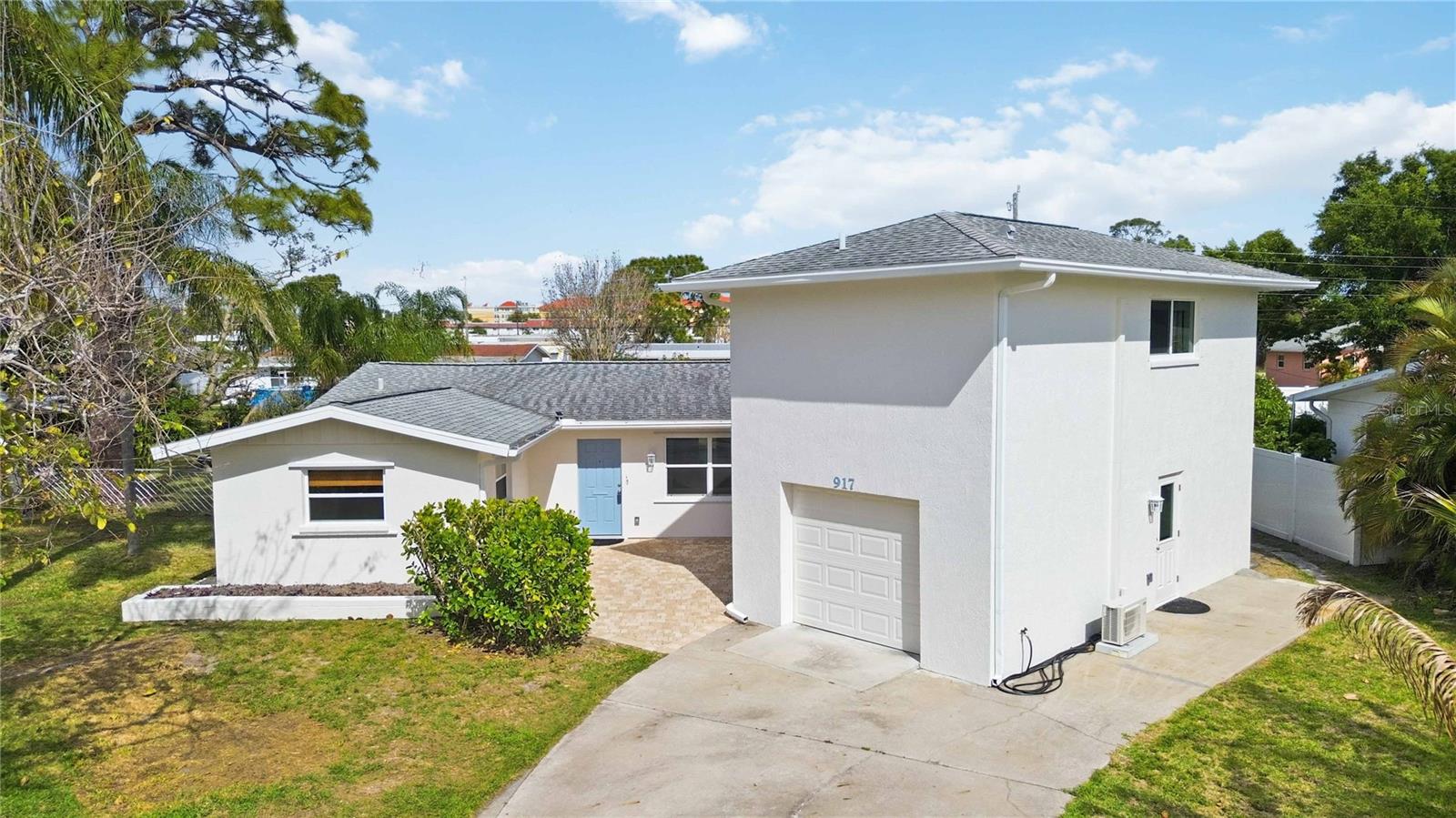 Come enjoy living in paradise on the highly sought-after Island of Venice in this remodeled home with IN-LAW SUITE, ideal RENTAL & INVESTMENT PROPERTY, located just over 2 miles from Venice Beach, SPACIOUS BACKYARD w/ room for SHED or POOL! The one-of-a-kind in-law suite located above the garage with a SEPERATE ENTRANCE and features a spacious bedroom complete with a kitchenette, Murphy bed, large walk-in closet, and an ensuite bath with ample cabinets and a shower with a rain head--the new mini-split (2025) has both heating & cooling, and there is a water filtration system along with a 220-volt plug in the kitchenette--the perfect space for family, friends, AirBnb, an office...the opportunities are endless! This home has recently been updated with hurricane impact windows, a freshly painted exterior, luxury vinyl plank flooring throughout, updated lighting & fans, on-demand hot water, a completely remodeled kitchen with ALL the upgrades...and MORE! The “open” floor-plan home invites comfortable and relaxing beach living. Stepping inside the home you're welcomed with a spacious "great room" that is open to the lanai which has both heating and cooling allowing you to easily expand your living space. This area has tile flooring, two sets of pocketing sliding glass doors for privacy from the living area, and french doors leading out to the large lanai...a great bonus space! The stunning kitchen is a chef's dream boasting wood cabinets with soft close drawers, kick-plate lighting, under cabinet lighting & custom motion lighting in the lazy Susan corner cabinets, extra deep drawers and some with custom plate organizers, quartz countertops, glass tile backsplash, a built-in cabinet pantry, plus Whirlpool quality stainless steel appliances, and a top-of-the line JennAir cooktop--an amazing kitchen that you will fall in love with. The dinette features a custom made bar that you can use as a buffet when entertaining guests. 
The primary suite is spacious with dual walk-in closets and attic access in both for additional storage along with an updated ensuite bath that has Cambria quartz countertops, wood cabinets with ample storage space, dual sinks, a private water closet, and an impressive shower with elegant tiled walls, flooring and a shower bench. The second bedroom is roomy with a sizable closet and the same, easy to maintain LVP flooring. The inside utility room doubles as a half bath and located just off the kitchen with access to the garage and inlaw suite, and offers additional storage space with additional cabinetry. The oversized single car garage will accommodate a vehicle and offers additional storage space. 
The expansive lanai area (35’ x 17’) just under 600 sq. ft. is the perfect location to enjoy that morning cup of coffee, relax and read a book or enjoy evening refreshments. The backyard is the perfect place to let the dog run around, while you relax on a chaise lounge and feel the warm Florida sunshine while admiring ALL of the many plants, flowers, and fruit trees for all the nature and bird lovers! Enjoy the added bonuses of this home including a transfer switch to hookup a generator, new sewer lines installed ($15,000), the home was re-pipped, and is located in an  "X flood zone". Located just minutes from the shops and dining on Venice Ave., medical facilities, golfing, and more--this home has been lovingly cared for. Don't miss this RARE OPPORTUNITY to make this one-of-a-kind home in paradise your dream come true!