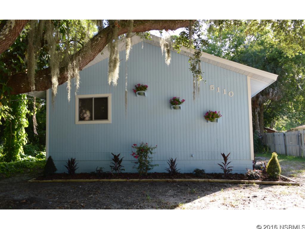 Adorable Bungalow style 2 bedroom home in a unique setting. Completely remodeled and in wonderful move-in condition. Beautiful flooring, new kitchen, stainless appliances, new paint inside and out, new decking. This home also has a NEW ROOF, and NEW AC system. Room in home for stack Washer/Dryer. The lot is very deep so room to potentially add a 2 car garage. PERFECT FOR A YOUNG COUPLE, RETIREES OR SECOND HOME GETAWAY. Only a 10 min drive to shopping, restaurants and the beach. ;Water: City