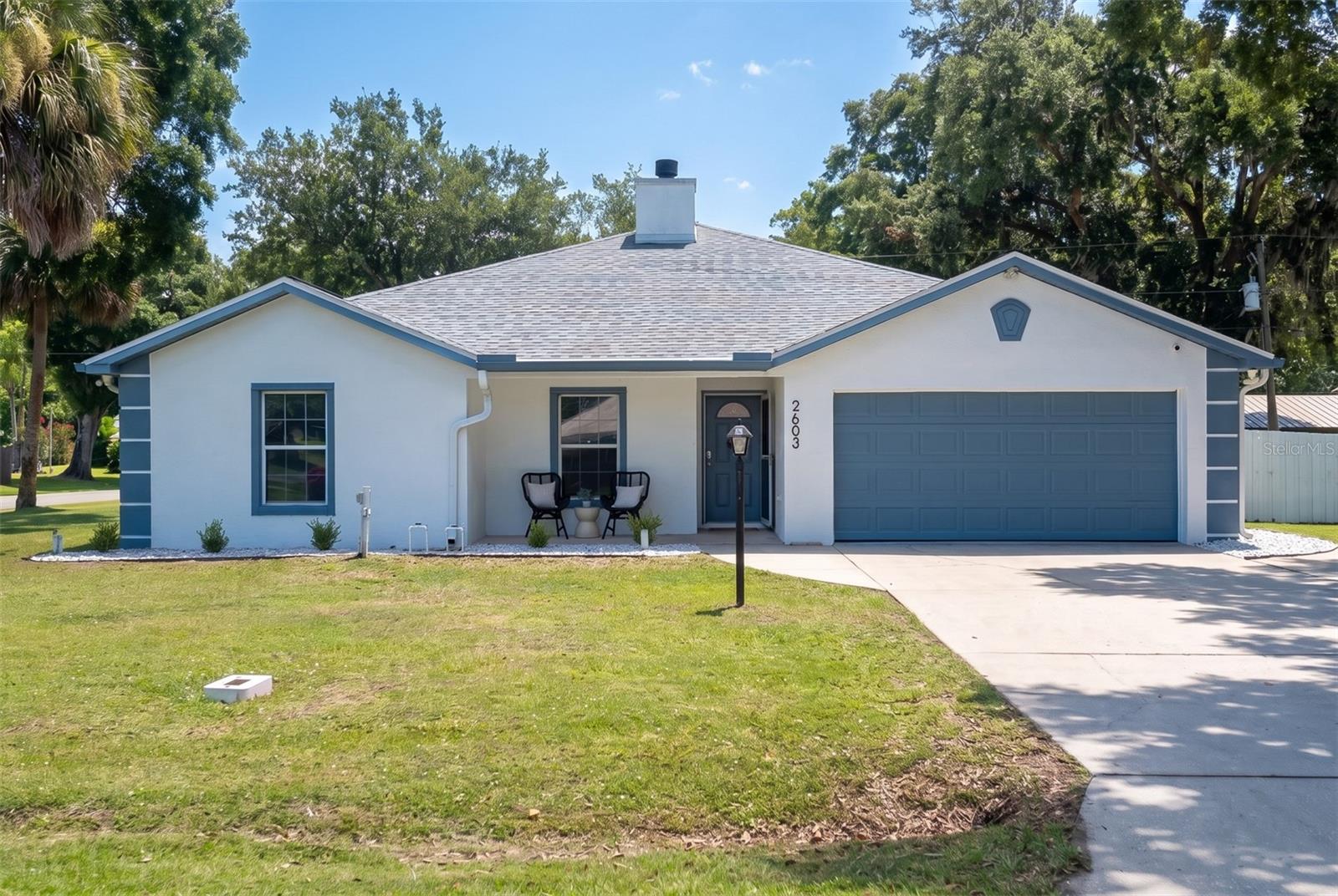 Situated on a spacious triple corner lot in Edgewater, this charming 3-bedroom, 2-bath home offers plenty of room both inside and out. The open-concept floor plan creates a comfortable flow between the living, dining, and kitchen areas, making it ideal for everyday living and entertaining. The primary suite features a double vanity and tiled walk-in shower, while luxury vinyl plank flooring extends throughout the home. Step outside to enjoy the oversized fenced backyard with a screened porch, providing the perfect space to relax, entertain, or let pets and family play. Additional features include an exterior block storage shed with ample storage space. Conveniently located near shopping, dining, parks, and the Intracoastal Waterway, this home offers comfort, functionality, and plenty of outdoor space to enjoy.