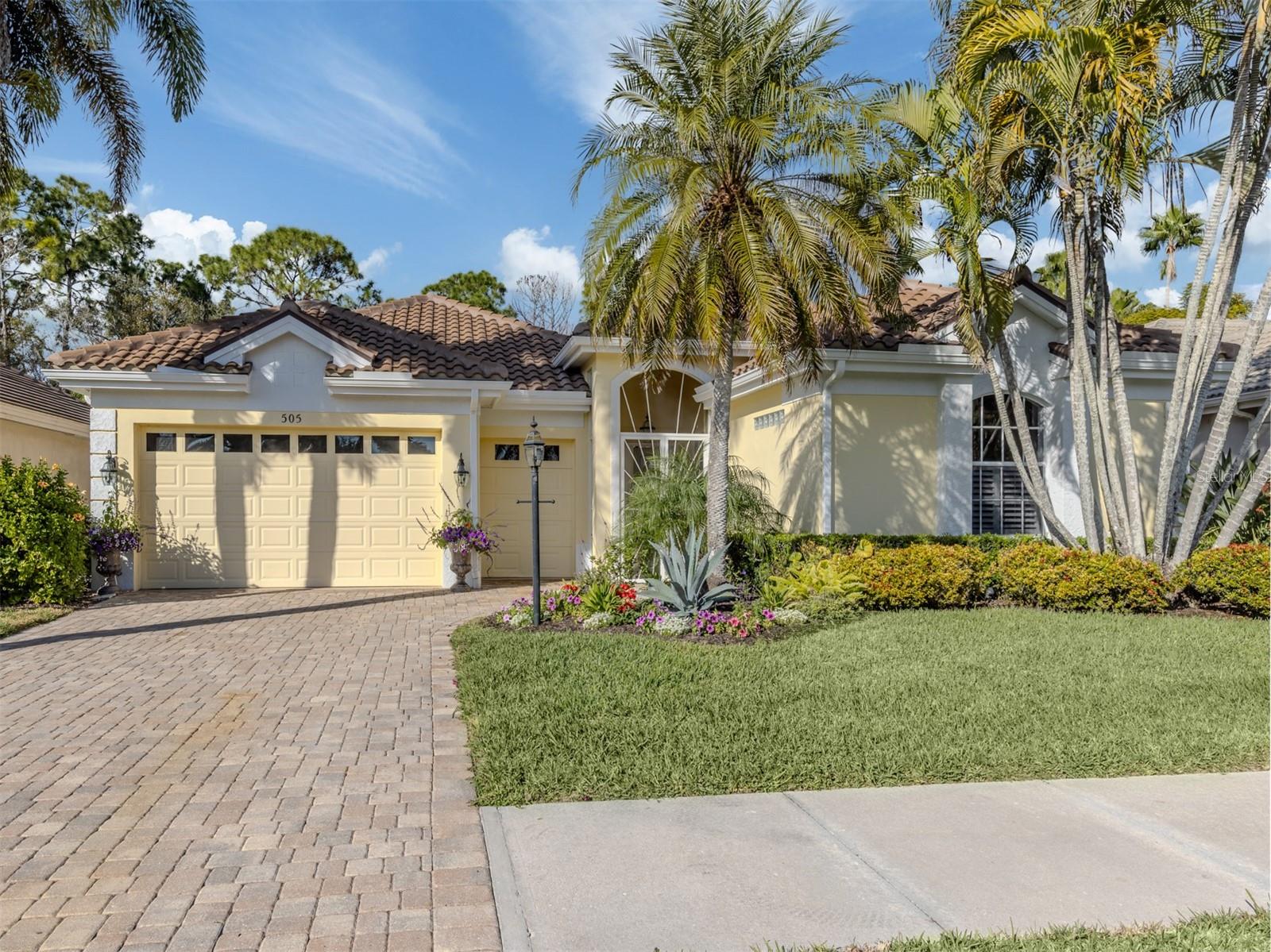 Exceptional courtyard home providing a refined blend of comfort, style and privacy in The Venice Golf and Country Club and surrounded by lush tropical landscaping. Golf membership immediately available with this spectacular listing! Newer Roof (5 yrs old with transferable warranty), two newer HVAC's, new water heater, exterior lighting on front magnificence palm trees and house re-plumbed. Elegant moldings, high ceilings and neutral beige tile flooring throughout set the tone for this residence. Beautiful ceiling details in the family room are accentuated with built-ins and lots of natural light with one wall of sliders leading to a private screened lanai. Another wall of glass sliding doors leads to the private, paver courtyard featuring a pool and spa, TV, sitting areas and a summer kitchen complete with a bar top, grill, sink and refrigerator. The desirable casita with living room, kitchen, bedroom, and bath is ideal for guests, a home office or multigenerational living. Thoughtfully designed for functionality, the kitchen features an abundance of cabinetry accentuated with quartz countertops, breakfast bar, center island that anchors the space, and a pantry. The open layout creates an inviting atmosphere that’s ideal for relaxed mornings and hosting guests. Filled with natural light via bay windows, the charming breakfast nook provides built-in cabinetry with a convenient desk area, and a sliding glass door that opens to the lanai, creating an inviting space and effortless indoor-outdoor living. A serene retreat, the primary suite has two spacious walk-in closets and a well-appointed en-suite bath designed for luxury and function. The bath offers double-sink vanity and makeup area, linen closet, walk-in Roman tile shower, built-in soaking tub and a private water closet. Formal dining room with sliders to the courtyard, another bedroom, one and a half baths, a spacious laundry room and a two-car plus golf cart garage complete the home. Set against a serene preserve setting, it creates a peaceful backdrop and a sense of retreat, ideal for relaxed, upscale Florida living. The Venice Golf and Country Club has been recently reimagined. The expanded contemporary clubhouse features a spacious gathering bar, gourmet and commercial kitchens, inside and alfresco dining options, and a cozy fire pit to gather around, with casual and special event dinners throughout the year. The new world-class state-of-the-art wellness center offers massage therapy, fitness classes, yoga, physical therapy, and personal training providing a holistic approach to health and well-being. The beautifully renovated Ted McAnlis-designed 18-hole championship golf course is treasured and highly rated as one of the best and well-maintained golf courses in the region. Residents also enjoy Har-Tru tennis courts, bocce ball, and a Junior Olympic-sized pool and spa, balancing active living with relaxation. As a Geo-Certified Audubon Cooperative Sanctuary, VGCC embraces environmental stewardship and sustainability. With an A-plus financial rating, the community is as solid as it is serene. Ideally, just minutes from airports, shopping, dining, Interstate 75, cultural venues and Wellen Park. It's also a short drive to charming Venice Island, where 14 miles of pristine beaches meet the sparkling Gulf Coast. Tranquility and relaxed living in one of Venice’s sought-after and spectacular communities, known for its friendly and active lifestyle.