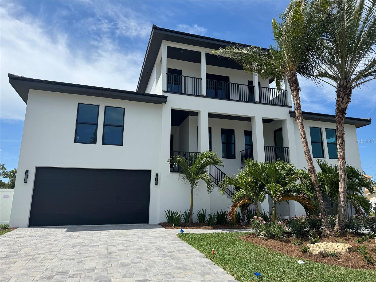 New Construction Belleair Beach Beauty! Home will be completed by the middle of May 2024...

Welcome to your dream home in the serene beach town of Belleair Beach, where residents enjoy exclusive access to a private stretch of sandy shores along the glistening waters of the Gulf of Mexico. This exquisite new construction home boasts all block construction, ensuring durability and peace of mind for coastal living.

Spread across nearly 5,000 square feet, this elevated property is well above the base flood elevation, blending safety with elegance. The residence features 5 spacious bedrooms and 3.5 bathrooms. The grand fifth bedroom doubles as a massive bonus room—ideal for a game room, home theater, or large home office.

The main floor study/den is perfect for remote work or quiet contemplation. The open and airy layout is designed to maximize natural light, creating a warm and inviting atmosphere that complements the beachside setting.

Outdoors, enjoy your private oasis with beautifully landscaped surroundings, ideal for entertaining or simply relaxing with the beach and ocean sounds in the background. This home is not just a place to live; it's a lifestyle offering unparalleled access to one of Florida's most beautiful beaches.

Experience beach town living at its finest in Belleair Beach, where every day feels like a vacation. This stunning new construction home is a rare gem, ready to provide a luxurious retreat for its new owners. Don't miss out on the opportunity to make it yours.