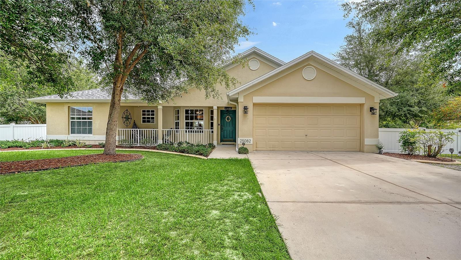 Under contract-accepting backup offers. Charming 3-bedroom, 2-bath single-family home with a 2-car garage, ideally situated on a cul-de-sac in the desirable Deep Creek community. This 1,571-square-foot home features an open split floor plan designed for comfortable everyday living, along with a welcoming front porch accented by railing and a beautiful shade tree. The standout feature is the oversized, fully vinyl-fenced backyard, offering plenty of room to relax, play, or enjoy time with pets, while the covered screened lanai provides the perfect place to unwind and take in the spacious outdoor setting. Recent updates include a freshly painted interior, a new roof in 2023 and new vinyl fencing in 2022. Conveniently located near I-75 and Kings Highway, this home combines comfort, privacy, and accessibility in a modest neighborhood setting.