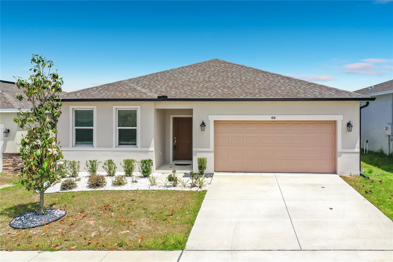Welcome to this beautifully maintained 4-bedroom, 3-bathroom home in the growing community of Mascotte. Offering a perfect blend of comfort, style, and functionality, this move-in ready residence is ideal for both families and those seeking extra space. Step inside to discover an open and inviting floor plan with abundant natural light, neutral finishes, and spacious living areas designed for modern living. The kitchen features ample cabinetry, generous counter space, and a layout that flows seamlessly into the dining and living areas—perfect for entertaining or everyday enjoyment. The primary suite provides a private retreat with a well-appointed en-suite bathroom and plenty of closet space. Three additional bedrooms offer flexibility for guests, family and/or home office. One of the additional bedrooms also features its own private bathroom, making it perfect for guests, in-laws, or a private home office setup. The remaining bedrooms offer flexibility for a variety of needs, and the three full bathrooms ensure convenience for everyone. Outside, enjoy a well-kept yard with room to relax or personalize to your liking. The attached two-car garage and wide driveway provide plenty of parking and storage options.
Located in a quiet neighborhood with easy access to nearby shopping, dining, and major roadways, this home offers both tranquility and convenience. Don’t miss your opportunity to own a spacious home in one of Central Florida’s up-and-coming areas—schedule your showing today!