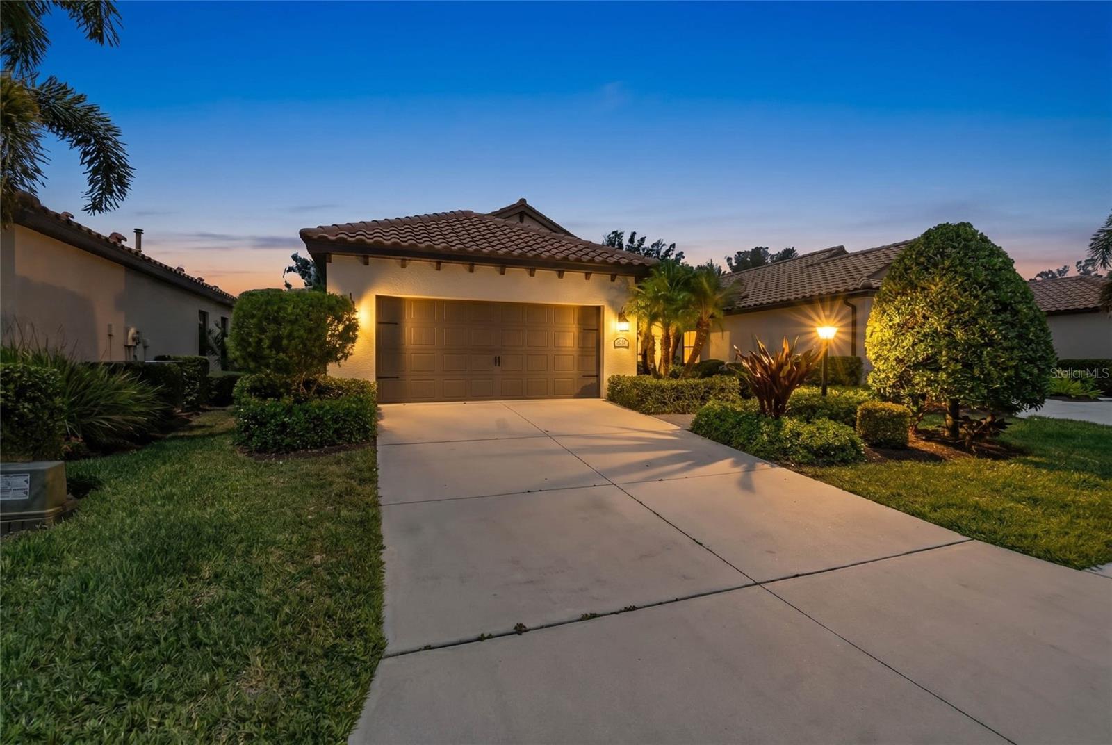 Located in the sought-after Indigo community, this well-maintained 3 bedroom, 2 bathroom home with a dedicated office or den offers a thoughtful layout, quality finishes, and a comfortable, move-in ready living experience.

Inside, the home features a bright and inviting layout with well-connected living spaces and abundant natural light, creating a comfortable setting for both daily living and casual gatherings.

The centrally positioned kitchen includes granite countertops, stainless steel appliances, a spacious island with sink, and ample cabinetry, all opening to the dining and living areas for a seamless flow.

A split-bedroom floor plan provides added privacy, while the dedicated office/den offers flexibility for remote work, hobbies, or additional living space. Tile flooring extends throughout the main living areas, with luxury vinyl plank flooring in the bedrooms, offering the look of wood with durability and ease of maintenance.

New AC system installed in April, adding efficiency and peace of mind.

Additional features include hurricane shutters, a Rainbird irrigation system, an interior laundry room, screened lanai and a 2-car garage. The covered front entry and mature landscaping contribute to the home’s overall curb appeal.

Residents of Indigo enjoy access to a clubhouse, fitness center, resort-style pool, and other community amenities. The location also offers convenient proximity to schools, shopping, dining, and major roadways.

This property presents a well-rounded opportunity for those seeking a clean, functional home in a well-established community with key upgrades already in place.