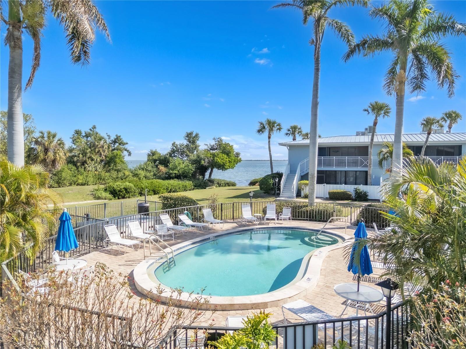 From the elevated and coveted 2nd (Top) floor, Experience the ultimate Anna Maria Island lifestyle in this beautifully updated and turnkey-furnished condo at Westbay Cove in the heart of Holmes Beach. Perfectly positioned just steps from the sugar-sand beaches and turquoise Gulf waters, this spacious residence offers the ideal blend of relaxed coastal living, investment potential, and resort-style amenities.

Inside, the bright and inviting open floor plan is filled with natural light and designed for effortless island living. The condo features a spacious primary bedroom, a second spacious bedroom with two queen beds for guests, a beautifully updated kitchen, comfortable living area, and a private sunroom overlooking lush tropical landscaping and the pool area — creating the perfect setting for morning coffee or sunset cocktails.

Offered fully furnished and move-in ready, this property is ideal as a primary residence, vacation getaway, or income-producing investment.