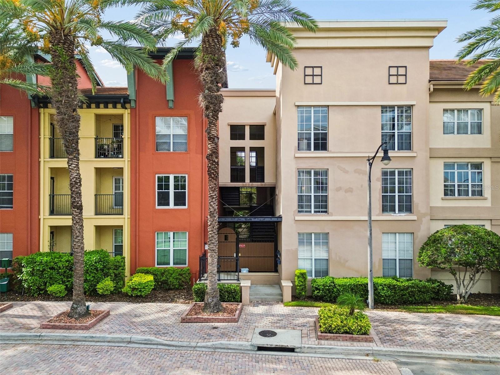 Live the SoHo lifestyle in one of Tampa's most walkable and convenient locations! Nestled within the gated Madison at SoHo community, this beautifully maintained condo places you just steps from Publix, CVS, Starbucks, Panera, restaurants, coffee shops, fitness studios, and the vibrant nightlife of South Howard Avenue. Enjoy easy access to Hyde Park Village (approx. 0.5 miles), Bayshore Boulevard (approx. 1 mile), Downtown Tampa, Water Street, Armature Works, I-275, and Tampa International Airport.

Inside, the bright and airy floor plan offers seamless flow between the kitchen and living area, creating an inviting space for both everyday living and entertaining. Large windows in the living room fill the home with natural light. The spacious primary suite is a standout feature, offering TWO closets, including a generous walk-in closet, plus enough room for a large desk and dedicated work-from-home setup. The bathroom features a relaxing garden soaking tub, while the dedicated utility room with in-unit washer and dryer provides valuable additional storage space.

Recent updates include a newer A/C system (2025) and an oversized refrigerator, offering both comfort and peace of mind. The assigned parking space is conveniently located just steps from the unit, making daily living effortless.

Residents of the Madison at SoHo also enjoy resort-style amenities including a tropical oasis pool, spa, grilling areas, lush landscaped courtyards, and gated access throughout the community. This home offers the perfect combination of location, comfort, and community in the heart of South Tampa.