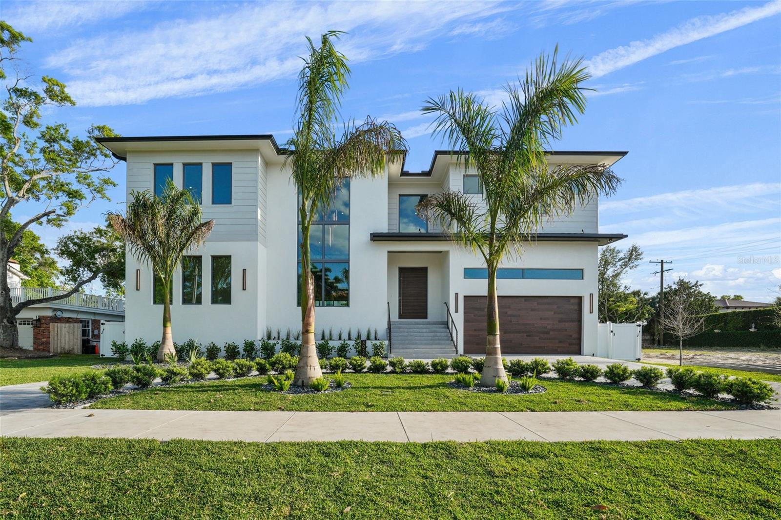 JUST COMPLETED. MOVE IN READY!!!! Welcome to your Dream Home built by luxury home builder Brookshire Homes.  Step into unparalleled luxury including all block construction with 5 Bedrooms, 5 Full Bathrooms, 2 Half Baths, 3 car garage, bonus room and so much more.  This stunning pool home is meticulously designed to offer the ultimate in modern living. Nestled in the prestigious neighborhood of Sunset Park, this architectural masterpiece boasts spacious Interiors and high-end finishes.  Just under 6000 square feet of living space, this home features an open floor plan that seamlessly blends elegance and comfort.  The Gourmet Kitchen is state-of-the-art and a chef's dream, equipped with top-of-the-line Thermador appliances, custom cabinetry, and a large island perfect for entertaining.  Each bedroom is a private retreat, complete with en-suite bathrooms and walk-in closets.   Downstairs features a large guest suite, formal dining room, large family room and secondary laundry room.  Upstairs you will find 3 large secondary bedrooms, spacious game room, main laundry room, and your luxurious private master suite.  The beautifully landscaped backyard includes a sparkling pool, outdoor kitchen, and plenty of space for relaxation and entertainment. HOME COMES WITH KOHLER GENERATOR!!!  Situated on an oversized 85x132 lot, this home offers top-rated schools, fine dining, and shopping, Experience the epitome of luxury living in this exquisite new construction home. Schedule your private tour today and make this dream home yours!!!  Call for your detailed feature sheet.