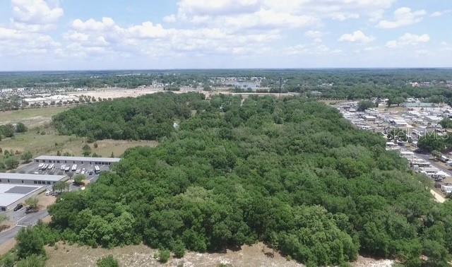 19.39 Zoned CP, Planned Commercial on Rolling Acres Rd in Lady Lake city limits. The property has 660 feet of paved road frontage on Rolling Acres Rd and 1,280 feet on Oak St. FDOT Average Trips per day on Rolling Acres is 15,300. The property’s uses include multi-tenant commercial buildings, retail centers, service-related businesses, restaurants, mixed-use developments, multi-family housing, retail, medical offices, and professional offices. The property is located in a corridor to The Villages, one of the largest retirement communities in Florida. The Villages spans over 80 square miles, equivalent to more than 51,200 acres. Remarkably, The Villages continues to grow and ranks among the fastest-growing cities in Florida. The Villages community encompasses multiple zip codes and is situated in three distinct county jurisdictions: Lake County, Sumter County, and Marion County.