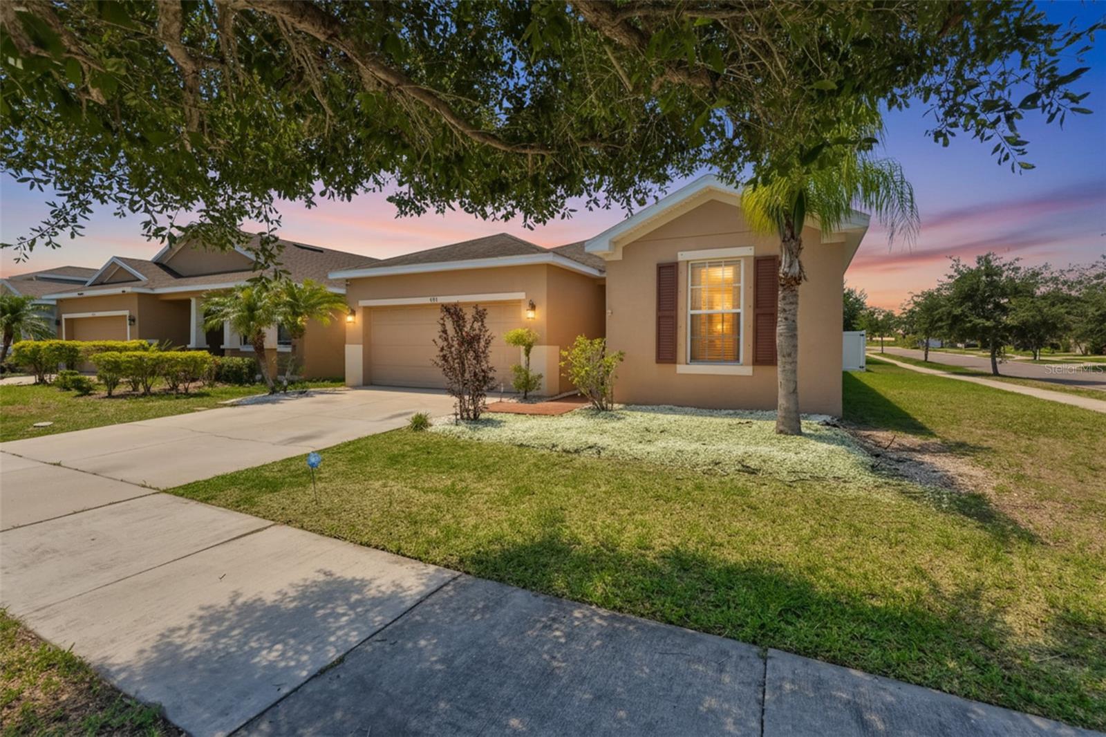Priced to sell! This beautifully maintained 2013 built home offers 3 bedrooms, 2 bathrooms, 1,583 square feet of living space, a desirable corner lot, large fenced backyard, and a 2-car garage. The inviting one-story floor plan features a spacious kitchen, open-concept living and dining areas, and a large primary suite complete with a walk-in closet and private ensuite bathroom. This home truly has it all plus low HOA, No CDD and no mandatory flood insurance required! You'll love the convenience of nearby schools, shopping, dining, and top-rated recreational destinations like E.G. Simmons Park, Little Harbor Resort, Apollo Beach Nature Preserve, and more. Quick access to US-41, I-75, Selmon Expressway, I-4, and I-275 makes commuting a breeze, with Downtown Tampa, MacDill AFB, Tampa International Airport, sports venues and Florida’s world-famous Gulf Coast beaches all within reach. Call today!