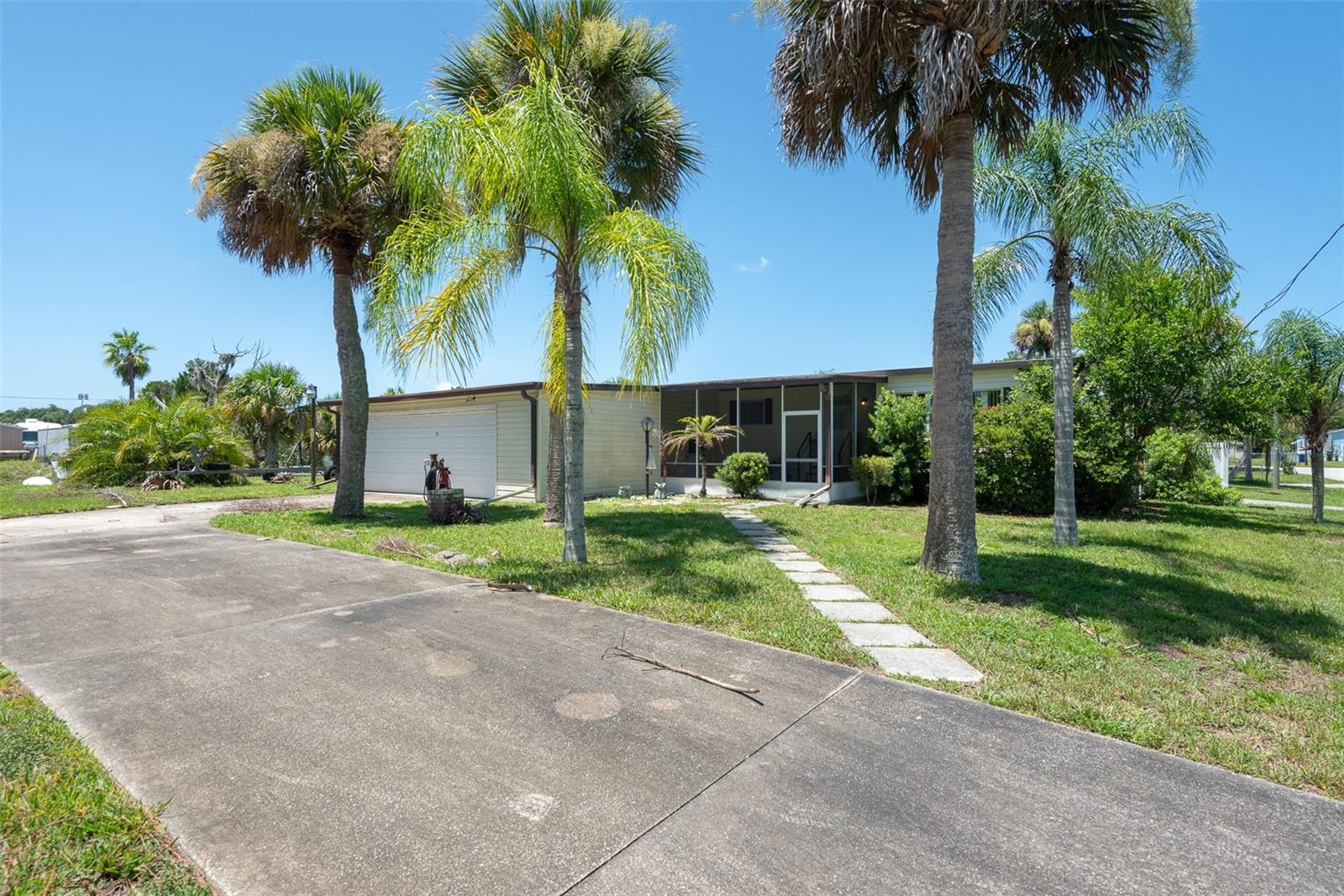 Welcome to 110 Charles Street in Edgewater, where endless possibilities meet an exceptional waterfront lifestyle. Situated on an approximately 0.30-acre double lot with an impressive 100 feet of canal frontage and direct access to the Intracoastal Waterway, this rare property offers the perfect opportunity to move in and add your personal touches or start fresh and build the waterfront home you've always envisioned.

A standout feature is the existing boathouse, making it easy to enjoy boating, fishing, kayaking, paddleboarding, and shrimping just steps from your backyard. Spend your days watching manatees glide through the canal, dolphins play in the Intracoastal, pelicans and seabirds dive for fish, and spectacular sunsets paint the evening sky. From the water, you'll even have a front-row seat to Cape Canaveral rocket launches.

Located in the sought-after South Waterfront Park community, you'll enjoy a peaceful coastal setting with convenient access to local shopping, dining, parks, and all that Edgewater and the surrounding area have to offer.

Whether you're searching for a primary residence, vacation retreat, investment opportunity, or the perfect homesite to build your dream waterfront escape, 110 Charles Street is a rare chance to own a piece of Florida's coveted saltwater lifestyle.