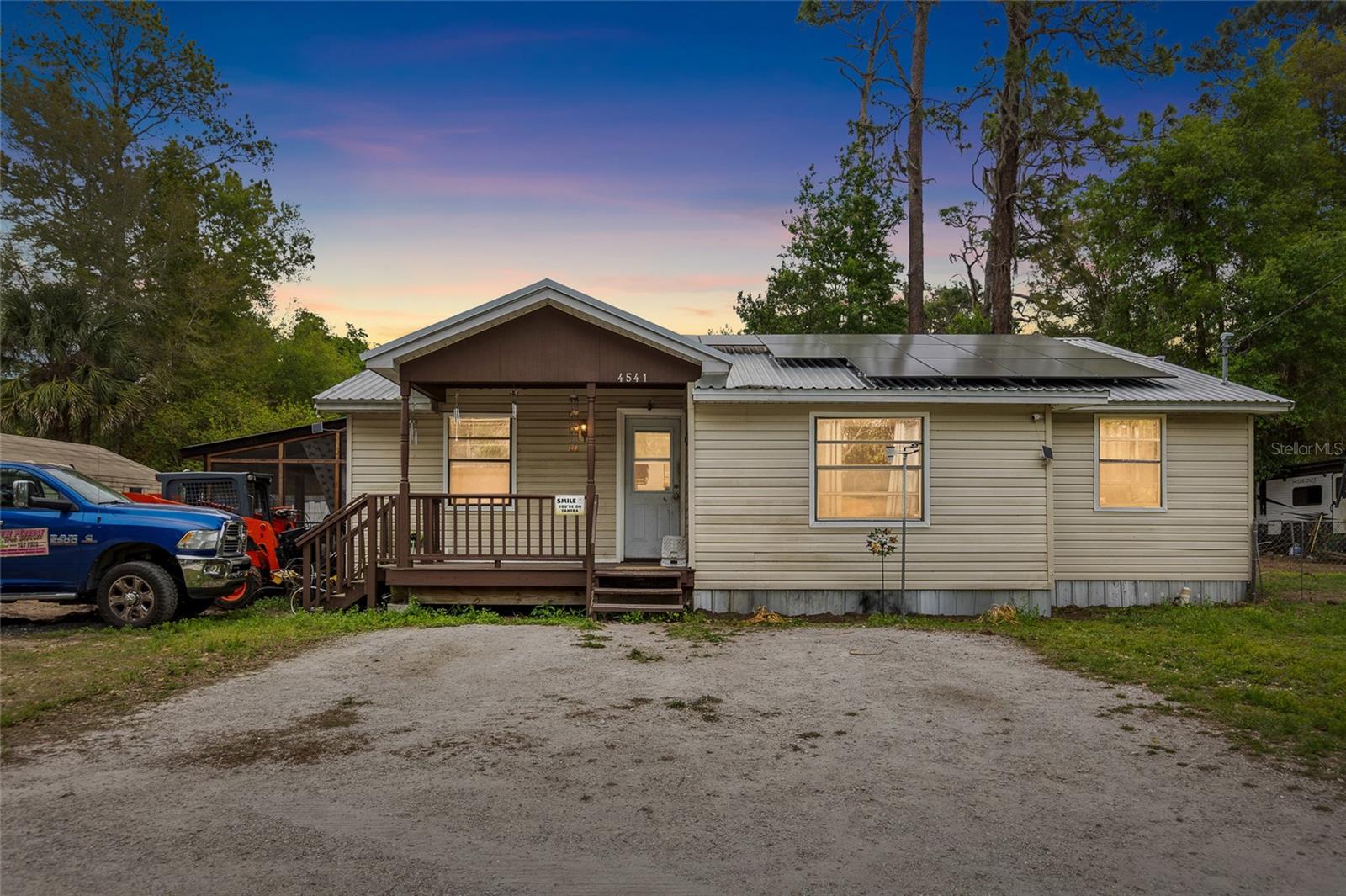 Tucked away in the quiet surroundings of Hernando, this inviting 4-bedroom, 2-bath home with a flexible bonus space for a 5th bedroom or home office offers the kind of charm and versatility that’s hard to find. With over 1,600 square feet of living space, the home welcomes you in with a layout that feels both comfortable and full of possibility, ready to adapt to your lifestyle.

From the moment you arrive, you’ll notice the character and functionality this property brings—featuring a metal roof, pier foundation, and thoughtful accessibility features including a ramp and accessible shower. Inside, hardwood flooring adds warmth throughout, while the spacious floor plan provides room to spread out, gather, or create dedicated spaces for work, hobbies, or guests.

Step outside and you’ll find even more to love—a detached shop with a lean-to, perfect for storing tools, working on projects, or simply enjoying extra space that gives this property an edge over the rest. Whether you need room for equipment, creative pursuits, or everyday convenience, it’s already here waiting for you.

Positioned in a Flood Zone X, this home offers added peace of mind with its low flood risk designation. The MDR zoning allows for residential flexibility, making this property a smart choice for a variety of buyers.

Conveniently located just minutes from major roadways like US-41 and FL-200, you’re never far from shopping, dining, and everything Citrus County has to offer—yet still tucked into a setting that feels relaxed and private.

If you’ve been searching for a property with space, character, and the freedom to truly make it your own, this is one you won’t want to miss. Schedule your showing today and come see the potential for yourself.

Metal ROOF
Newer Well Pump
Solar 2026
On Well and Septic
Wood Frame Home
Year Built 1968