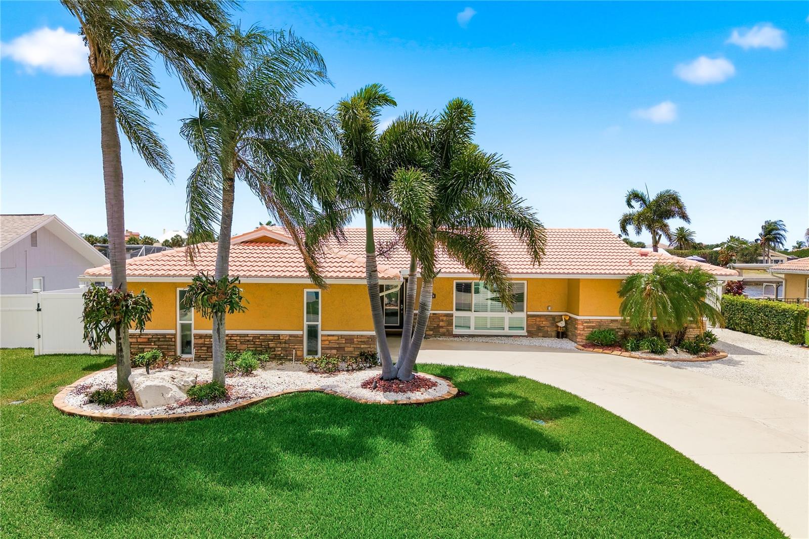 Experience luxury coastal living in this fully remodeled 4-bedroom, 3-bath waterfront home, thoughtfully upgraded with top-tier finishes and modern systems throughout. Every detail has been crafted with care, comfort, and long-term efficiency in mind.

Step outside to your private oasis featuring a heated and cooled pool overlooking a wide canal with captivating sunset views—the perfect backdrop for entertaining or unwinding at the end of the day. Boaters will appreciate the exceptional water access with two upgraded boat lifts (one 16,000 lb, one 8,000 lb), all-new electronics, and a floating dock ready for your next adventure.

Inside, the home shines with all new top-of-the-line appliances, hurricane-rated windows and doors, new recessed lighting, and a complete electrical rewire for peace of mind. Additional major upgrades include a new water softener, tankless water heater, spray-foam insulation, and a high-efficiency 3-zone A/C system designed for optimal climate control.

The entire slab has been professionally epoxied, adding durability and a clean, modern aesthetic. Every space has been freshly remodeled with exceptional taste, creating a move-in-ready home that blends coastal charm with contemporary luxury.

This is a rare opportunity to own a meticulously upgraded waterfront retreat offering premium features, effortless boating, and unforgettable sunsets. Call today for your personal private tour!!!