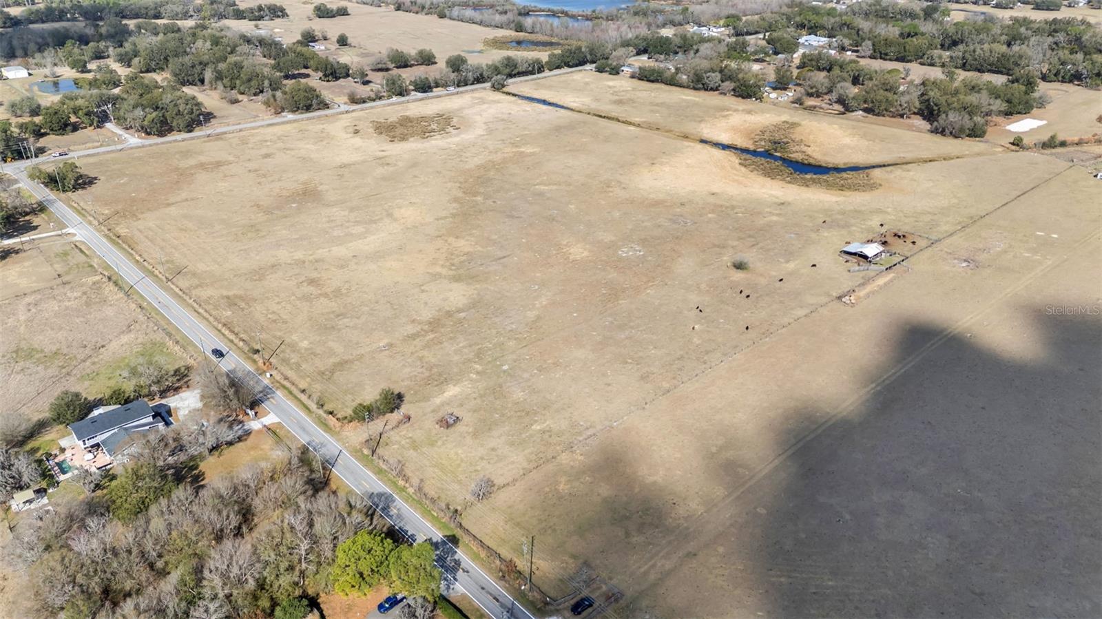 Rare opportunity to own 34.51 acres of fully fenced pasture land in Polk County, ideally located on the corner of Walker Road and Bella Vista. This beautiful acreage offers endless possibilities for ranching, farming, livestock, or future investment.

This parcel features a well already in place, providing a valuable resource for agricultural use. The property also includes a small pole barn that can be used for hay storage or to house farming equipment.

With excellent road frontage and a prime corner location, this is a hard-to-find tract of usable pasture land in a growing area of Polk County.

Don’t miss your chance to secure large acreage with utilities already established.