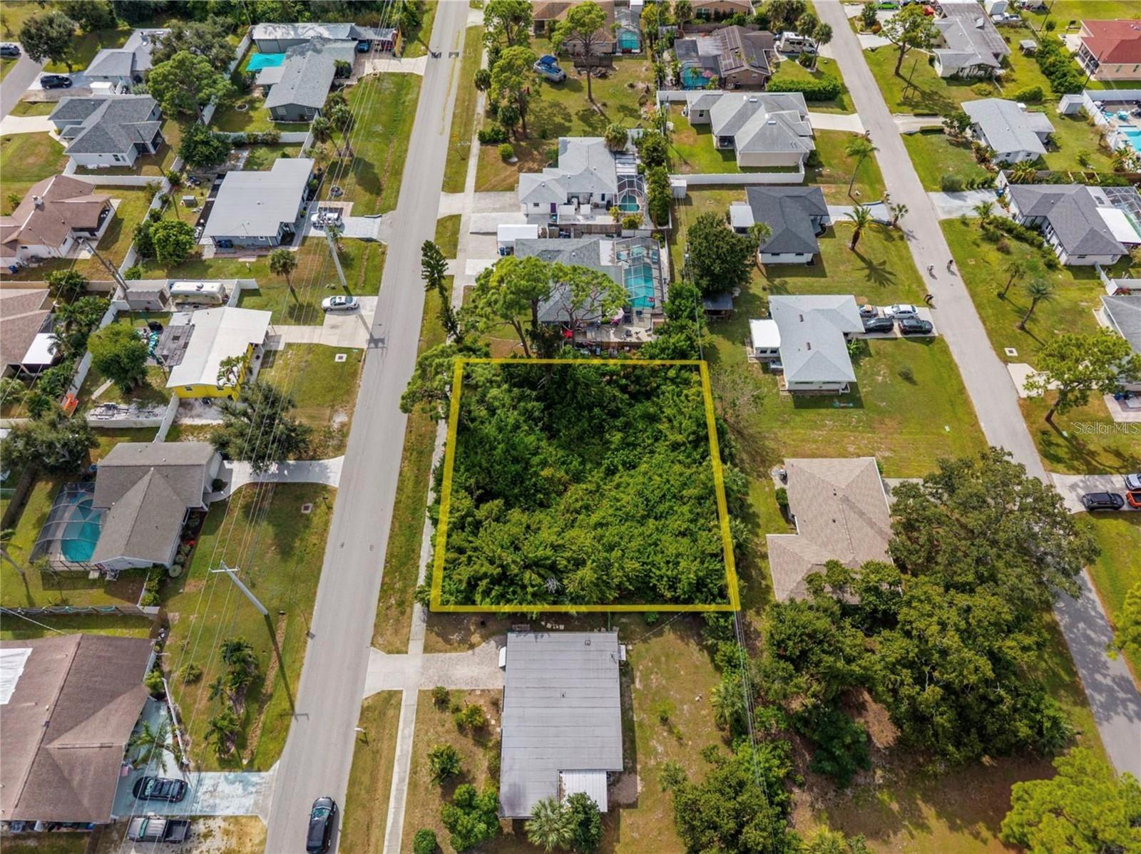 Build your dream home on this rarely available oversized 12,000 sq. ft. lot in the heart of South Venice. This property offers true Florida living— no CDD and no HOA fees! For a small voluntary annual fee, residents enjoy deeded beach access by private ferry, plus a boat ramp and
community center. You’ll love being close to Shamrock Park & Nature Center, which connects to 20 miles of trails along the Legacy Trail, and
Brohard Paw Park, perfect for dog lovers. This quiet, well-established neighborhood offers the best of both worlds—peaceful surroundings just
minutes from beautiful beaches, shopping, dining, parks, and I-75. Soil test and county approved plans included!