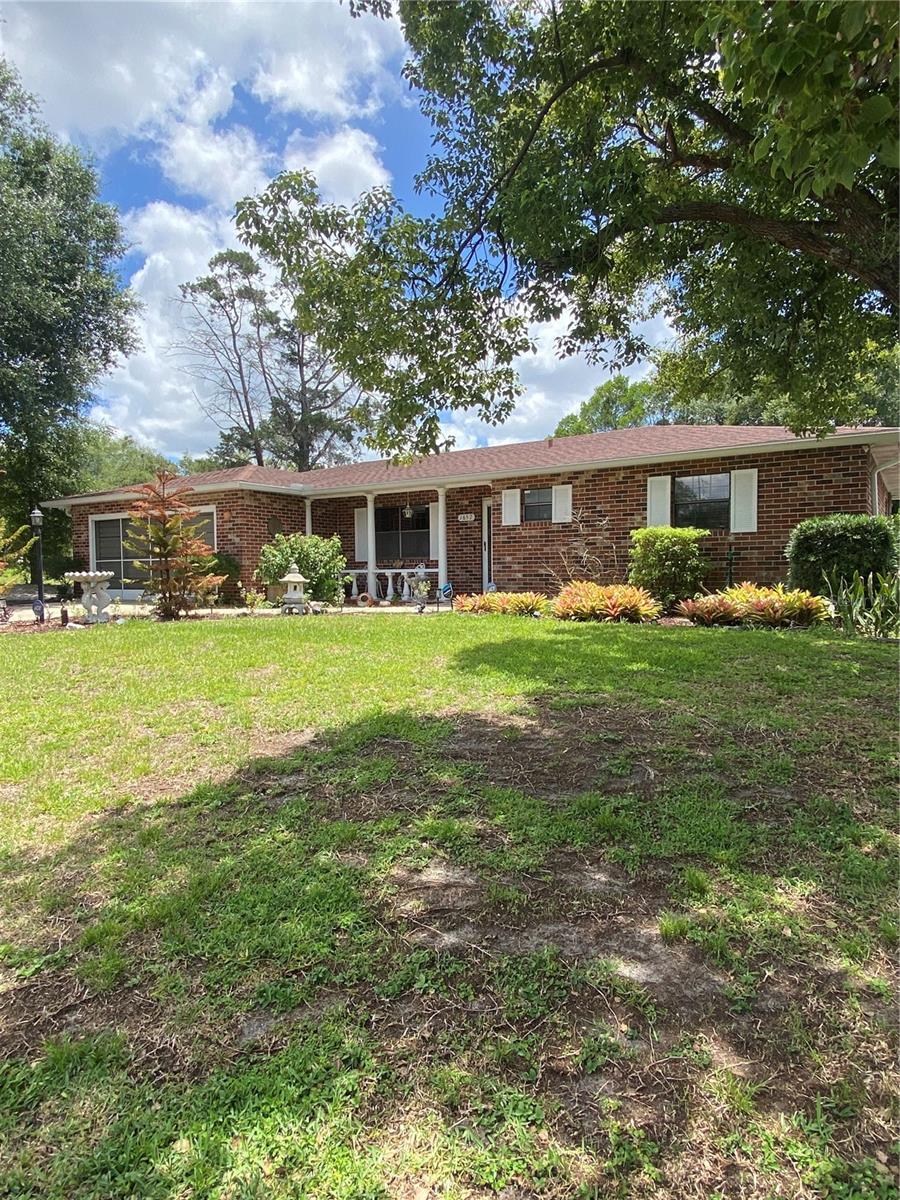 Beautifully maintained 2-bedroom 2- bath home in Deltona that is conveniently located to I-4. This home offers 2 spacious bedrooms with large closets, ceiling fans and new flooring. Reroof 2021.  The primary bedroom features an en suite bathroom with a walk-in shower and large vanity with plenty of cabinet space below. As you walk through the front door you enter a beautiful living area with new flooring, a large front window that faces west. As you passthrough the dining area into the Kitchen you will find a cozy family room with a brick fireplace that also leads to the sunny Florida room that is surrounded with double pane windows that looks out onto the beautiful large back yard. The large outdoor patio looks out on and leads to a shaded firepit that is perfect for entreating around the fire and roasting marshmallows with friends. The very back of the property has a separate large, fenced area for pets and offers shade from the sun. The large shed is perfect for storing your garden equipment and tools. The two-car garage plenty of shelving and a small office/workshop area that can be used or easily removed. Expect to be impressed with how well this home has been maintained and cared for!
All room sizes are to be verified by the buyer.