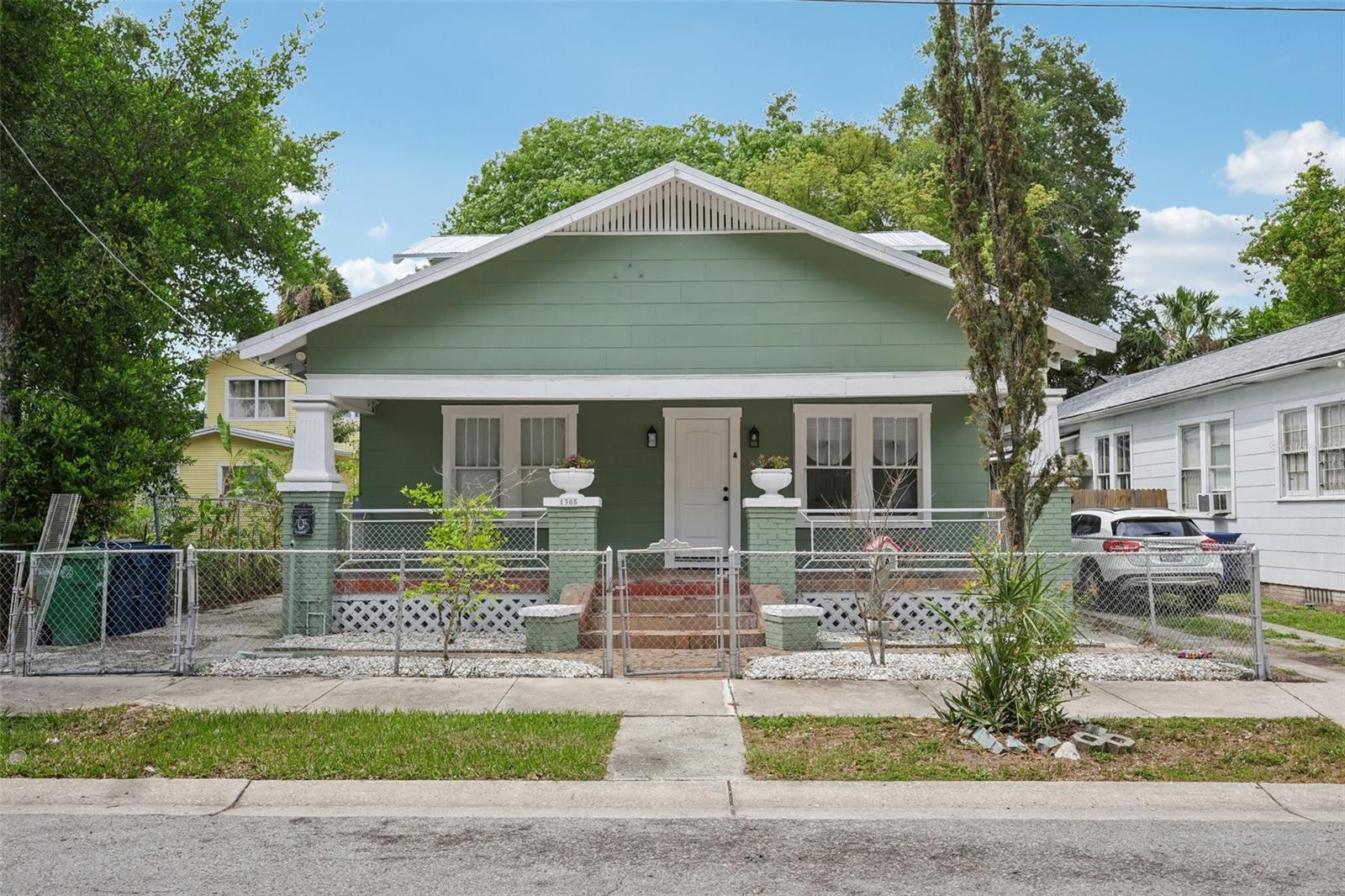 Exceptional investment opportunity in the heart of Ybor City! This fully renovated duplex offers outstanding income potential for long-term rentals, short-term rentals, or Airbnb use. Unit A features a spacious two-story layout with 3 bedrooms and 2 bathrooms, while Unit B offers 2 bedrooms, 2 bathrooms, and a versatile flex space. Both units have been beautifully updated with luxury vinyl plank flooring throughout, remodeled kitchens featuring pearl white soft-close cabinetry, granite countertops, stainless steel appliances, and freshly painted interiors. Renovated Bathrooms, New Water Heaters, Mini-split systems in every room, and in-unit Washers and Dryers provide modern comfort and convenience for tenants and owners alike. Additional improvements include a 2023 ROOF and a Leveled Foundation. Outside, enjoy an oversized, fully fenced courtyard perfect for entertaining or creating private outdoor spaces for each unit. It is ideally located with easy access to I-4 and I-75, major hospitals, downtown Tampa, Ybor City's dining and entertainment district, and Tampa Bay's premier sports venues. It is just a short drive to Clearwater and St. Pete beaches. Whether you're looking to expand your investment portfolio or live in one unit while generating income from the other, this turnkey duplex is a rare opportunity in one of Tampa's fastest-growing areas.
