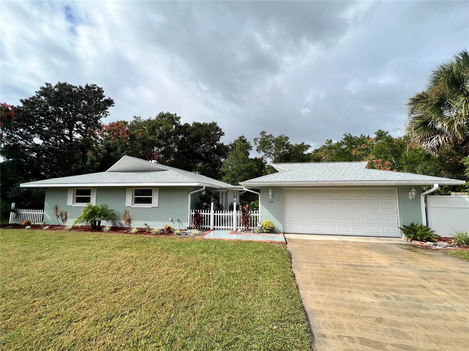 Welcome to your dream home in the heart of Central Florida! This meticulously renovated property is a true gem. This charming home is situated in one of Deland's most sought-after neighborhoods, perfect for those who love spending time outdoors and taking in the beauty of our sunny state. The great neighborhood offers a sense of community, with friendly neighbors and a welcoming atmosphere. As you step inside, you'll be greeted by the warmth and character of this beautifully renovated home. The open floor plan creates a sense of spaciousness, and the natural light that streams through the windows and doors highlights the thoughtful design! With a new roof and concrete block construction, you can enjoy peace of mind and protection from the Florida sun and occasional rain showers. Granite counters line the brand new kitchen outfitted with stainless steel appliances! Spend your cool evenings in the courtyard, tucked away from the world or relax on the screened porch. Schedule your showing today to see this one of a kind, fully renovated home!