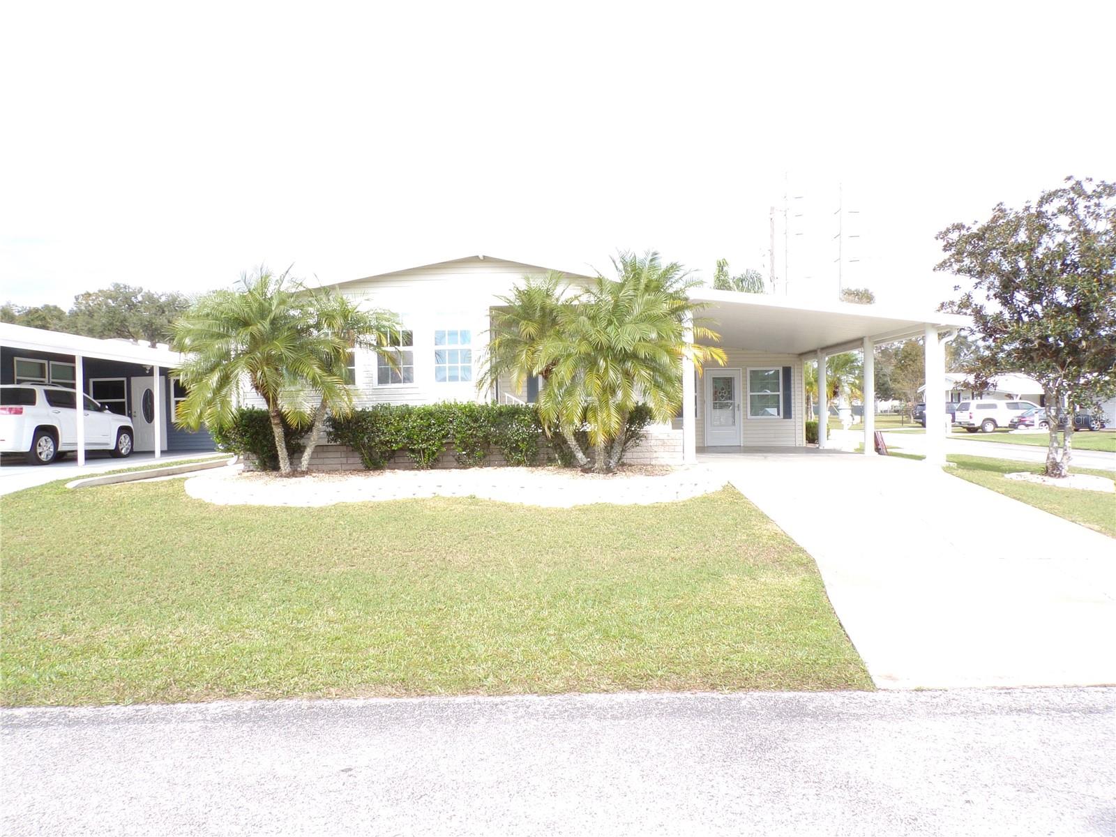 Welcome to your dream home in Betmar Acres a 55+ community where you own your land! This 2 bed/2 bath boast 1668 SF and has a beautiful florida room which is now part of the home. Step up into the laundry area then to the open kitchen dinning area. A nice office in the front of the home. Updated bathrooms and flooring. Nothing left here to do but MOVE IN!.  Outside you will a tranquil space to sit and relax and also have room for your car. A golf cart storage shed at the end. Don't forget it's near the 27 holes of golf, 2 swimming pools and 2 hot tubs along with 3 clubhouses, a library, walking paths, game rooms (Billiards, Table Tennis, Board Games) miniature golf, enclosed shuffleboard courts, tennis courts, pickle-ball courts, basketball court, Bocce courts, and Bingo. Schedule your appointment today, don't let this one get away Its one of a kind!