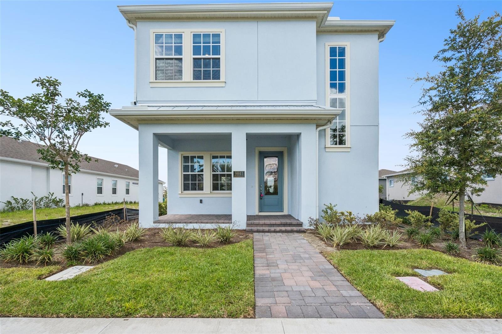 Move-In Ready | 2025 Home with Private Garage Apartment in Laureate Park, Lake Nona

Experience modern Lake Nona living in this stunning 2025-built home located in the highly desirable community of Laureate Park, known for its top-rated schools, exceptional amenities, and unbeatable location. Designed with both comfort and flexibility in mind, this beautiful residence features 4 bedrooms, 3.5 bathrooms, plus a private 1-bedroom, 1-bath garage apartment with its own separate entrance, full kitchen, and living area—ideal for guests, extended family, a home office, or income-producing opportunities.

The main home welcomes you with a bright open-concept layout filled with natural light, seamlessly connecting the living, dining, and kitchen areas. The gourmet kitchen is beautifully appointed with quartz countertops, stainless steel appliances, stylish cabinetry, and a spacious island perfect for entertaining. Upstairs, the luxurious primary suite offers a spa-inspired bathroom and generous closet space, while additional bedrooms and a versatile loft provide room for everyone.

Step outside to enjoy private outdoor living spaces designed for relaxing and entertaining year-round.

Residents of Laureate Park enjoy access to resort-style amenities including pools, fitness facilities, playgrounds, community events, and miles of scenic walking and biking trails. Conveniently located just minutes from Medical City, Nemours, the VA Hospital, Lake Nona Town Center, Orlando International Airport, shopping, dining, and major highways.

Discover the perfect combination of style, flexibility, and location in this exceptional Laureate Park home. With a private garage apartment complete with a full kitchen and bath, this property offers endless possibilities for extended family, guests, or additional income potential. Don't miss your opportunity to own a beautiful 2025 home in the heart of Lake Nona—schedule your private tour today!