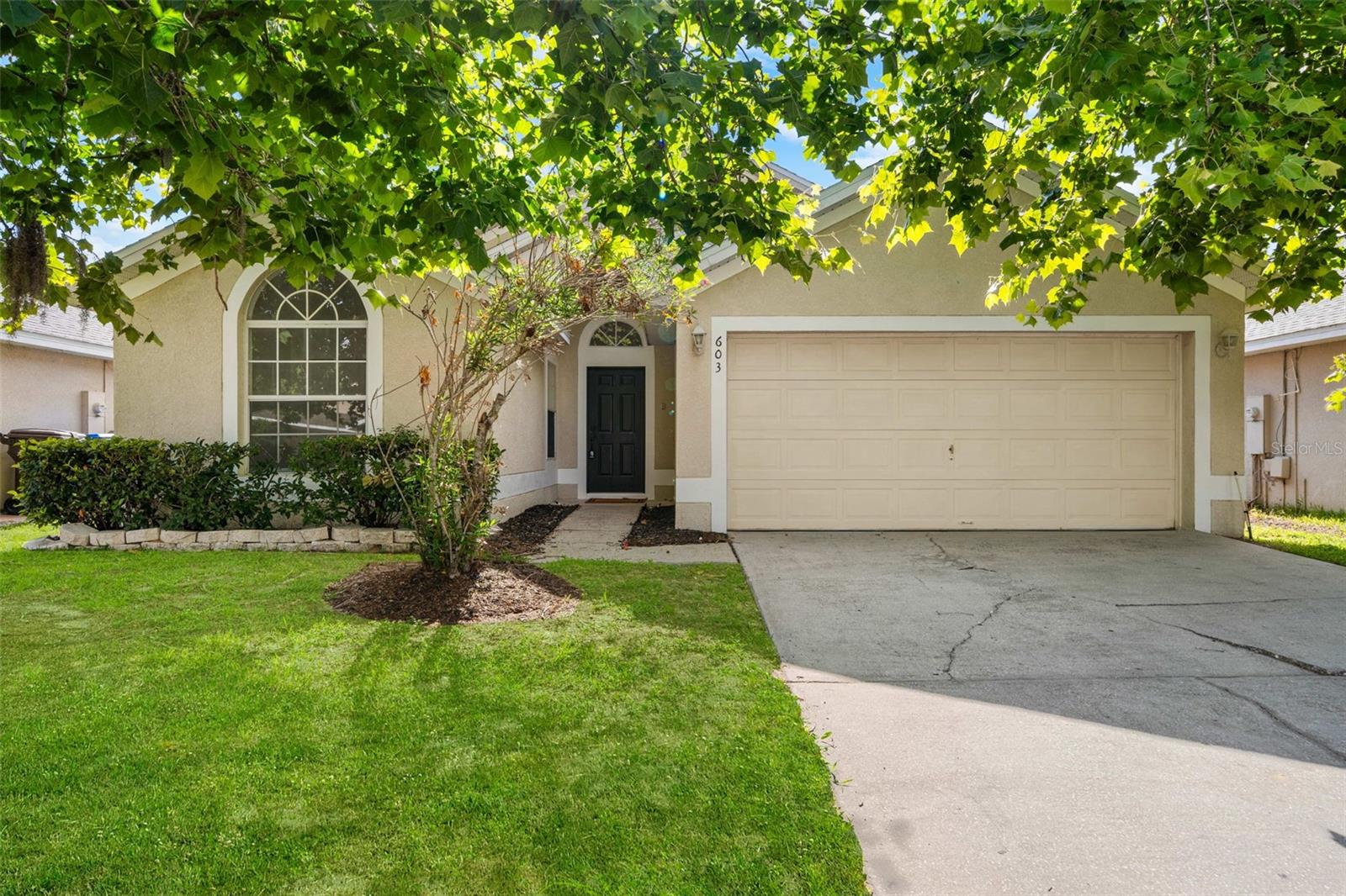 One or more photo(s) has been virtually staged. **RENNOVATED 4 BEDROOM POOL HOME** SHORT TERM RENTAL ALLOWED** LOW HOA** Welcome to 603 Keppel Court — a beautifully refreshed pool home tucked away in the desirable Bass Lake Estates community of Kissimmee. From the moment you arrive, you’ll appreciate the inviting curb appeal, mature shade trees, and peaceful cul-de-sac setting that make this home feel like a private retreat while still being close to everything Central Florida has to offer.

Step inside to discover a bright and airy open-concept layout featuring soaring ceilings, abundant natural light, and thoughtfully updated finishes throughout. The spacious living and dining areas create the perfect environment for entertaining guests, hosting holiday gatherings, or simply enjoying everyday life in comfort and style. The modernized kitchen offers generous cabinetry, ample counter space, breakfast bar seating, and a seamless flow into the main living spaces—ideal for both casual mornings and evening get-togethers.

This versatile 4-bedroom floor plan provides endless possibilities for today’s lifestyle needs. Whether you need dedicated guest rooms, a home office, fitness space, nursery, media room, game room, or creative studio, this home offers the flexibility to adapt to your vision. The spacious primary suite serves as a relaxing escape with a walk-in closet and private en-suite bath featuring dual vanities, soaking tub, and separate shower.

One of the standout features of this home is the private screened-in pool area—your own Florida oasis perfect for year-round enjoyment. Imagine relaxing poolside with your morning coffee, hosting weekend BBQs, enjoying sunset swims, or creating unforgettable memories with family and friends. The fully screened lanai offers both privacy and comfort while maximizing indoor-outdoor living.

Located just minutes from Disney, world-famous attractions, shopping, dining, golf, and major highways, this property also offers incredible income-producing potential. Short-term rentals are allowed, making this home an excellent opportunity for Airbnb and VRBO investors looking to capitalize on one of Central Florida’s most sought-after vacation rental destinations. Whether used as a primary residence, second home, vacation retreat, or cash-flowing investment property, the possibilities here are endless.

With low HOA fees, a functional single-story layout, and a prime location in the heart of Kissimmee’s booming tourism corridor, 603 Keppel Court delivers the perfect blend of lifestyle, flexibility, and investment potential. Whether you’re searching for a move-in-ready family home, a seasonal getaway, or a high-demand short-term rental opportunity, this exceptional pool home checks every box.

Schedule your private tour today and experience the lifestyle and possibilities waiting for you at 603 Keppel Court.
