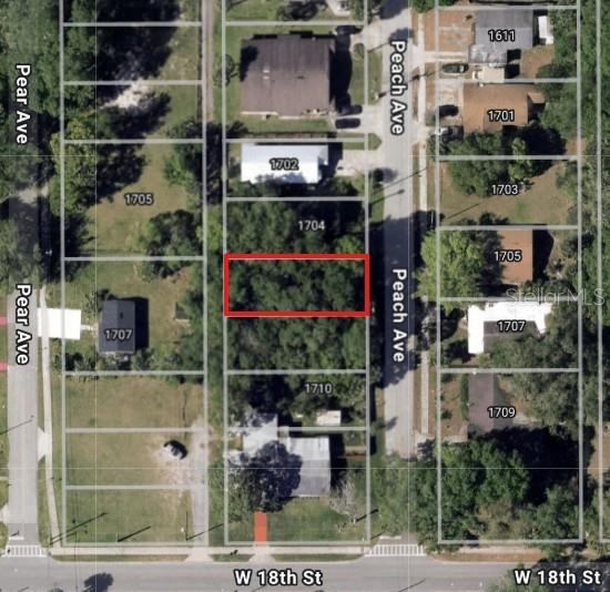 Vacant residential lot on Peach Ave in Sanford measuring approximately 100 ft x 40 ft. Strong potential for future development or investment. Lot 27 is also available, offering an opportunity to own side-by-side lots.